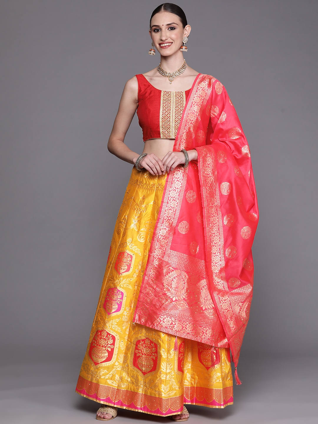 

Chhabra 555 Yellow & Coral Red Semi-Stitched Lehenga & Unstitched Blouse With Dupatta