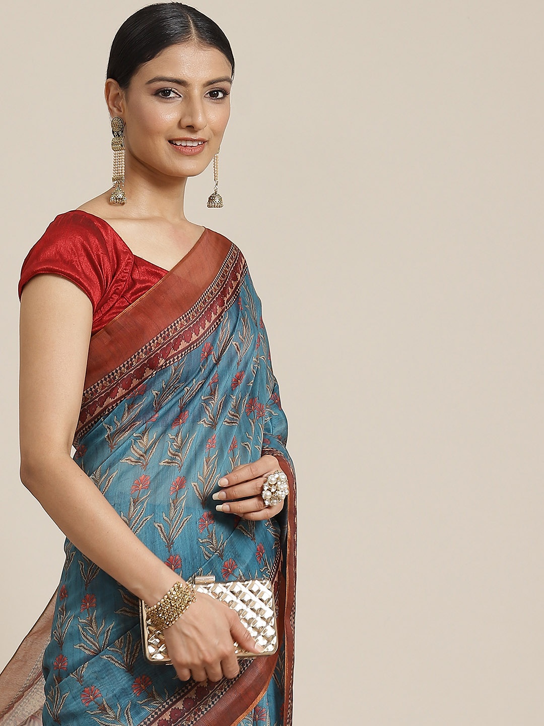 

Silk Land Teal & Red Kalamkari Cotton Saree