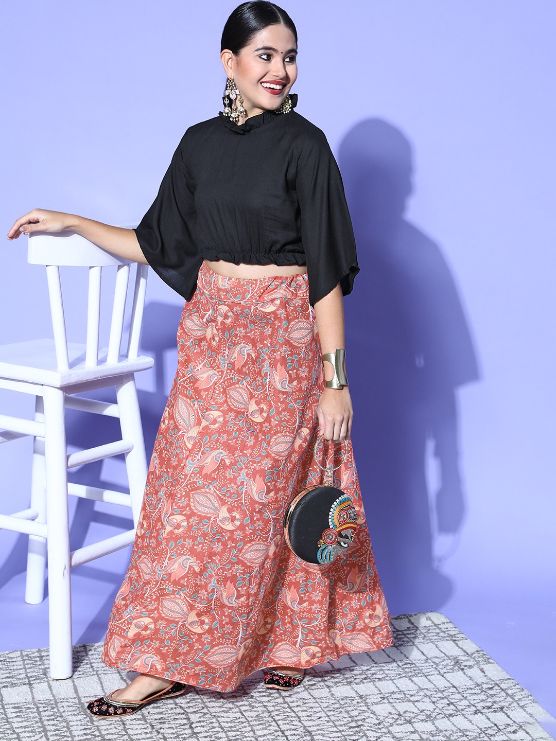 

InWeave Women Black & Peach-Coloured Solid Crop Top with Printed Maxi Skirt Co-Ords