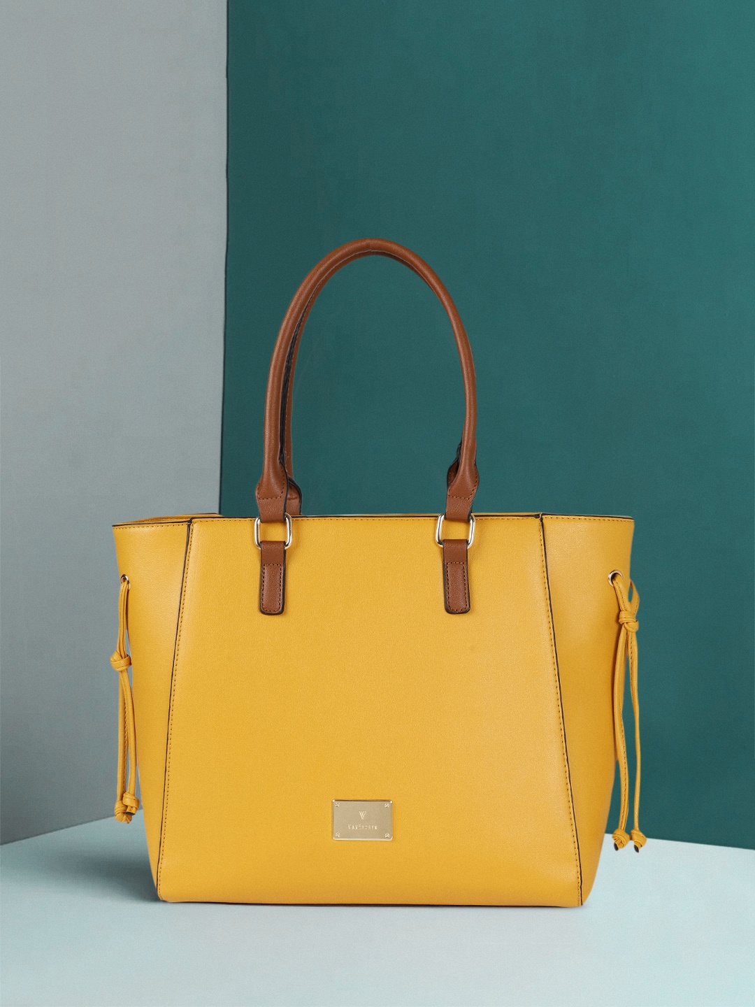 

Van Heusen Mustard Yellow Solid Tote Bag With Tasselled Detail