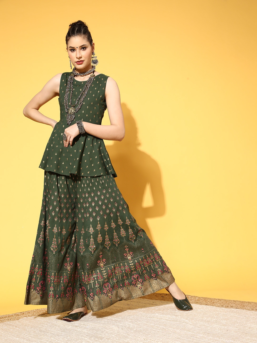 

InWeave Women Green Ethnic Motifs Printed Panelled Kurti with Palazzos