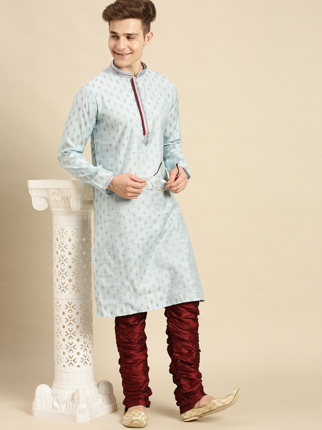 

Sanwara Men Blue Kurta with Churidar