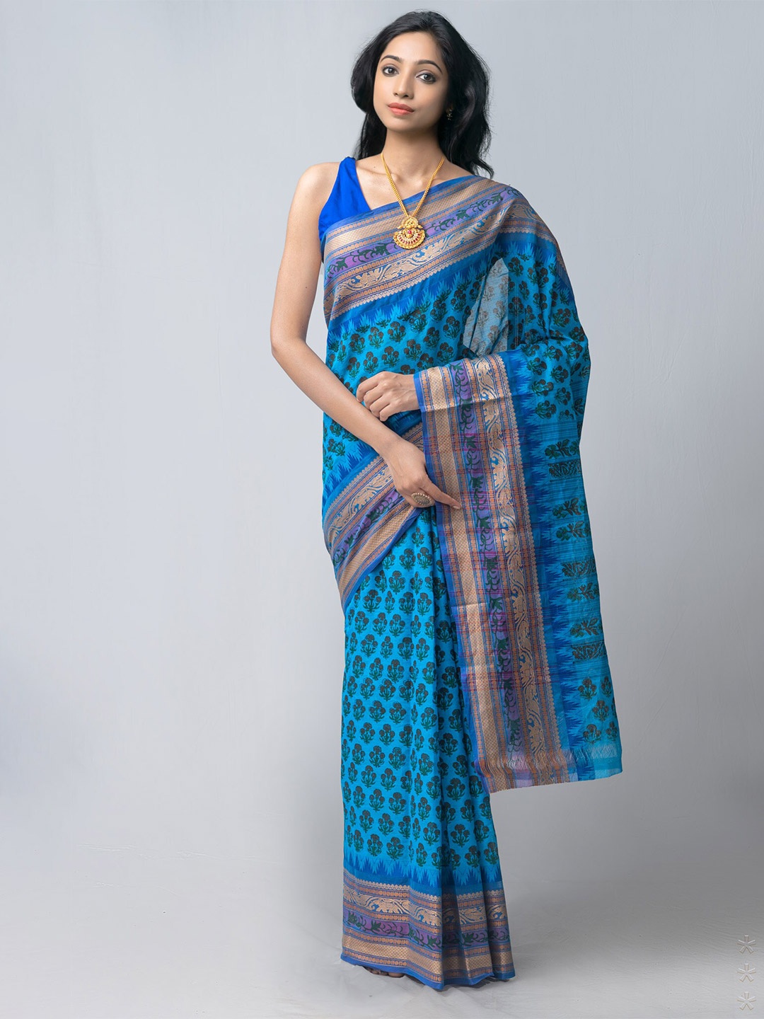 

Unnati Silks Blue & Green Ethnic Motifs Kanjeevaram Saree