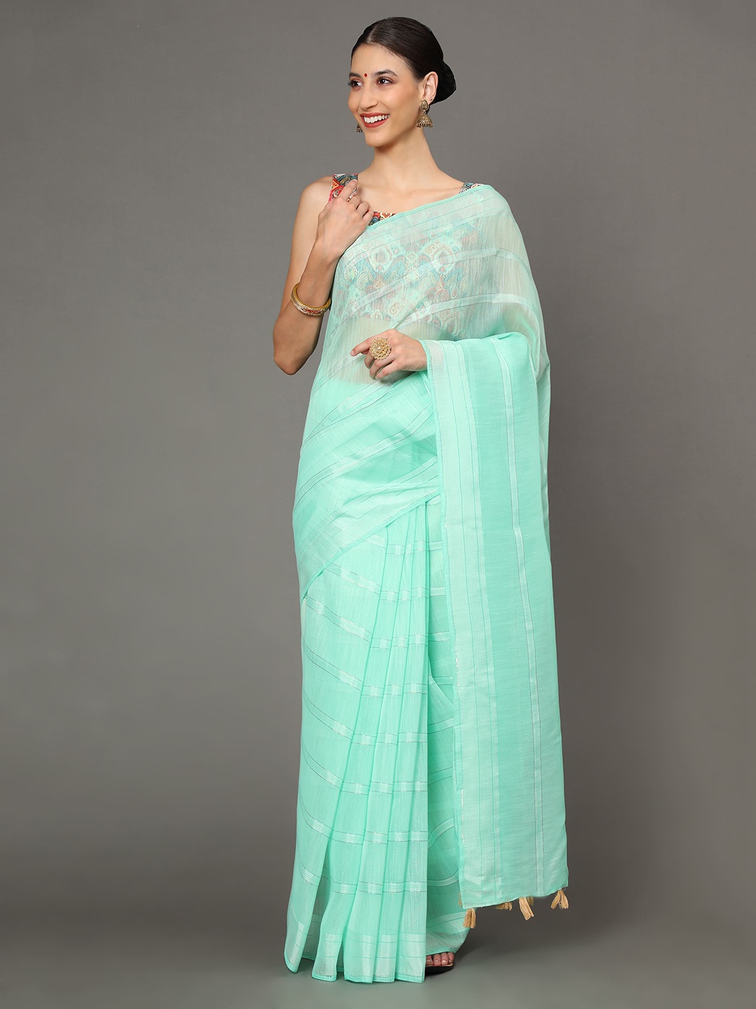 

Havida Sarees Turquoise Blue & Gold-Toned Striped Zari Arani Saree