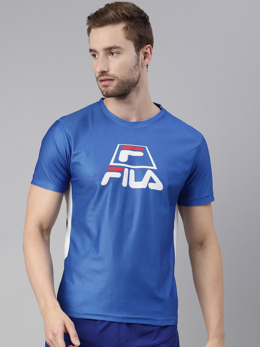

FILA Men Blue Typography Printed Organic Cotton Training or Gym T-shirt