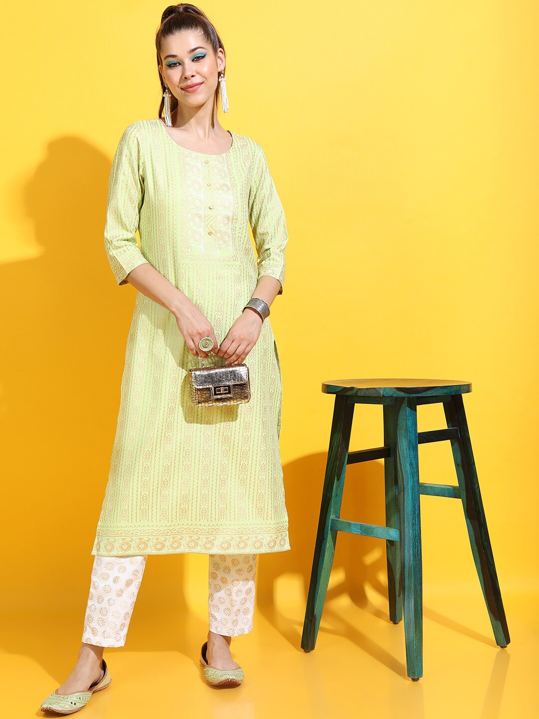 

Vishudh Women Off White & Lime Green Ethnic Motifs Printed Straight Kurta with Trousers