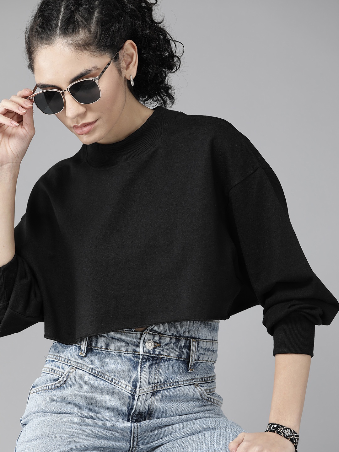 

Roadster Women Black Solid Crop Sweatshirt