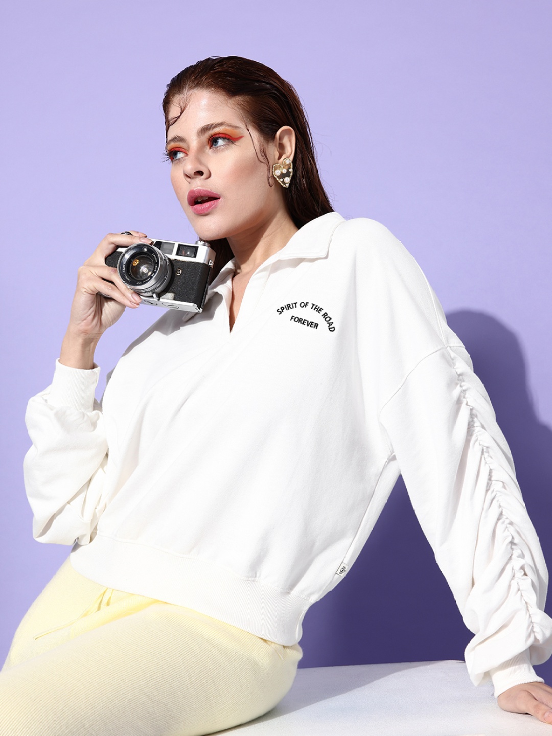 

Roadster Women Off White Solid Pattern Play Sweatshirt