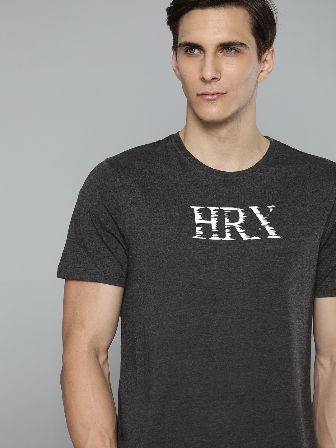 

HRX By Hrithik Roshan Lifestyle Men Black Mel Bio-Wash Brand Carrier Tshirts