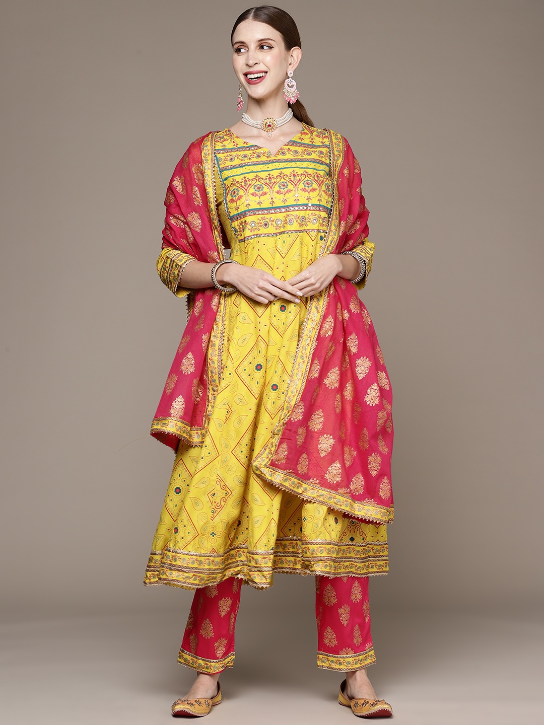 

Ishin Women Yellow Floral Embroidered Sequinned Kurta with Trousers & Dupatta