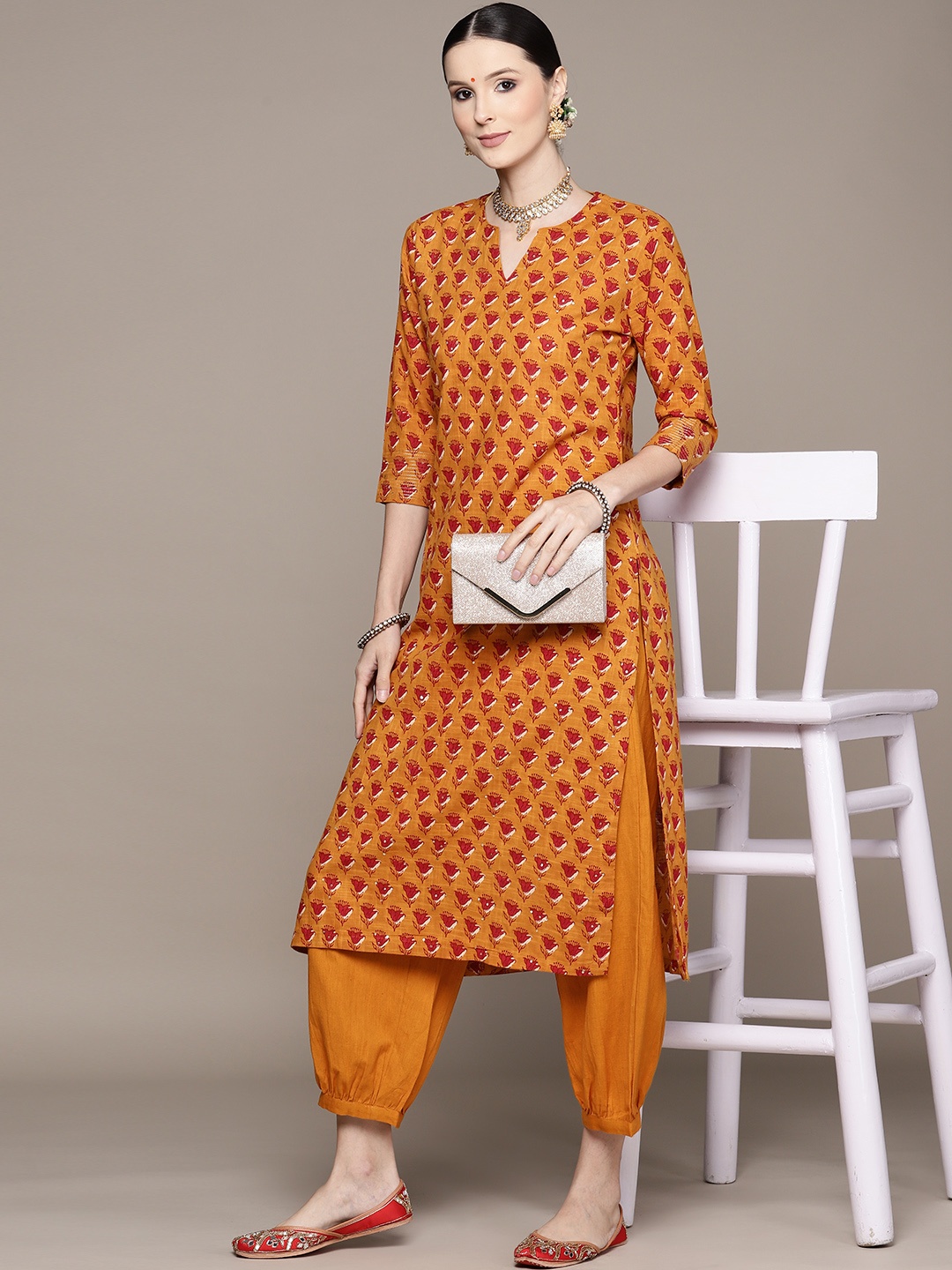 

Ishin Women Mustard Yellow Ethnic Motifs Printed Pure Cotton Kurta with Salwar