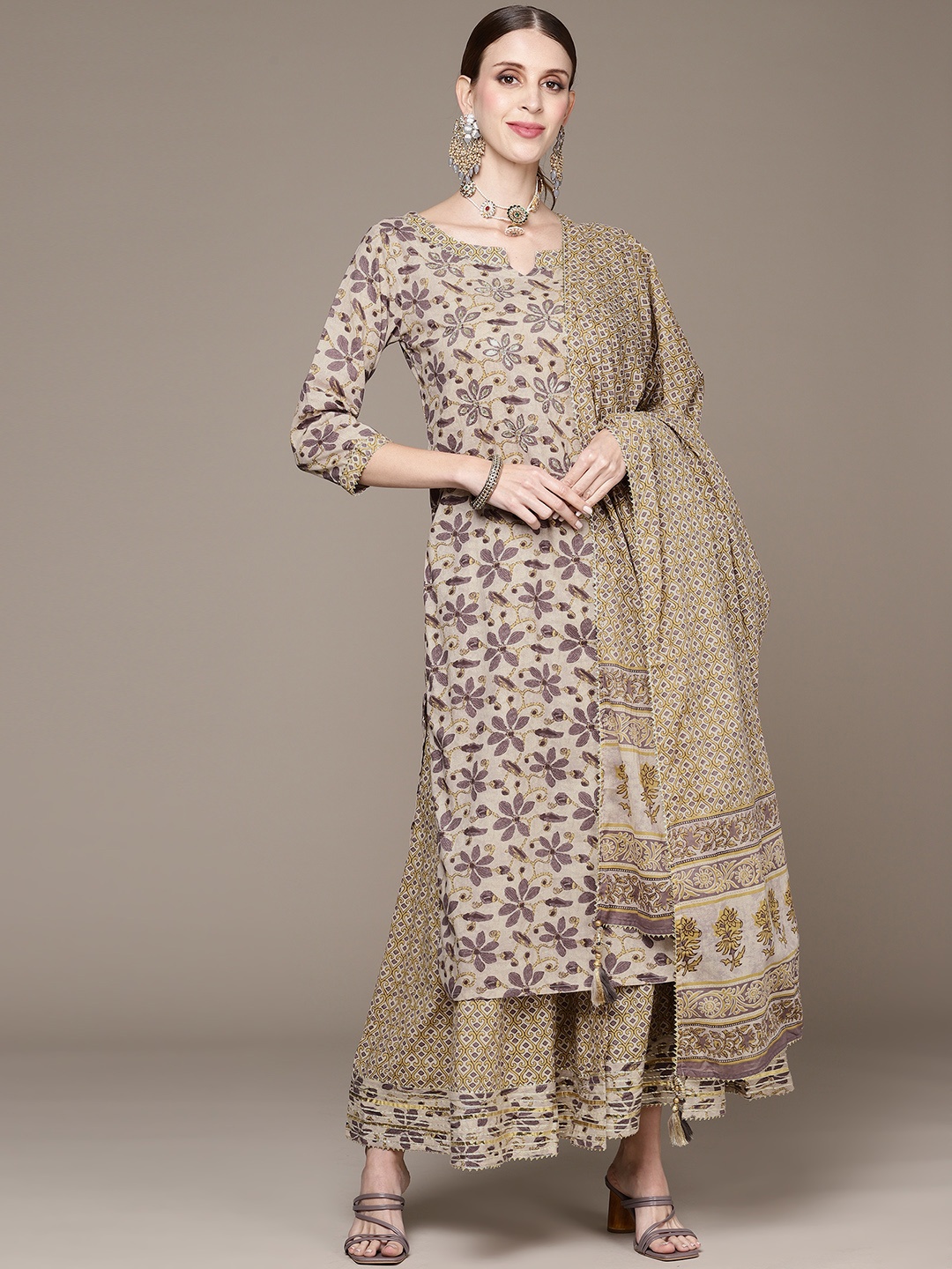 

Ishin Women Beige Floral Printed Mirror Work Kurta with Sharara & Dupatta