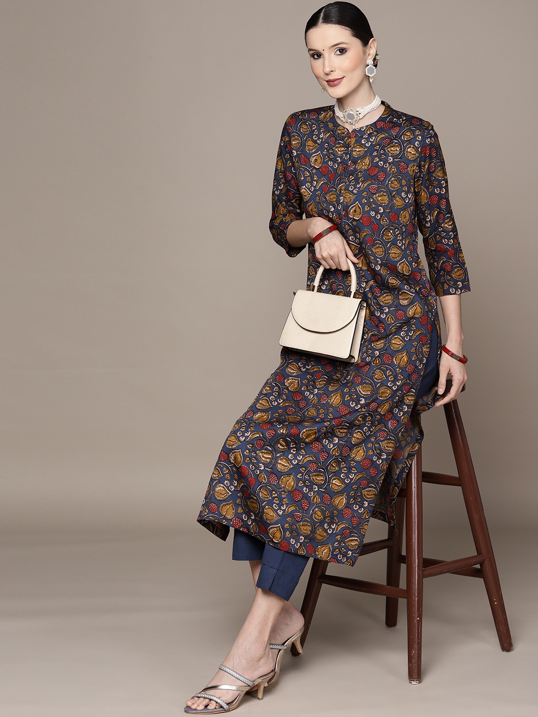 

Ishin Navy Blue Floral Embroidered Sequinned Kurta with Trousers