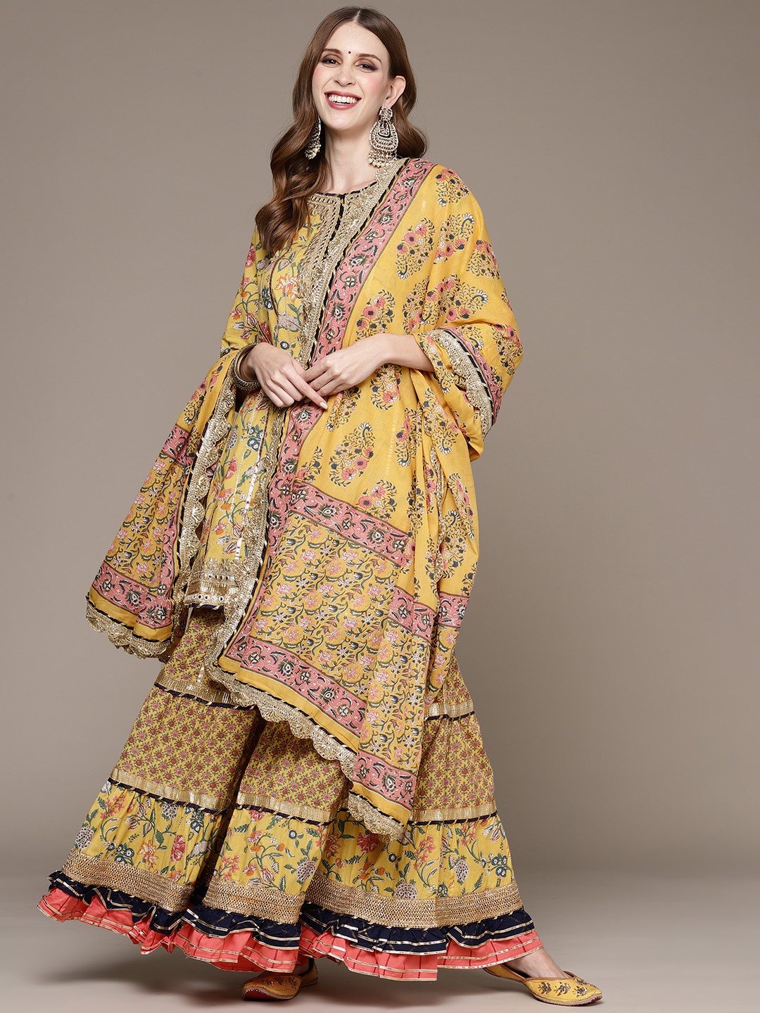 

Ishin Women Yellow Floral Printed Mirror Work Kurta with Sharara & Dupatta