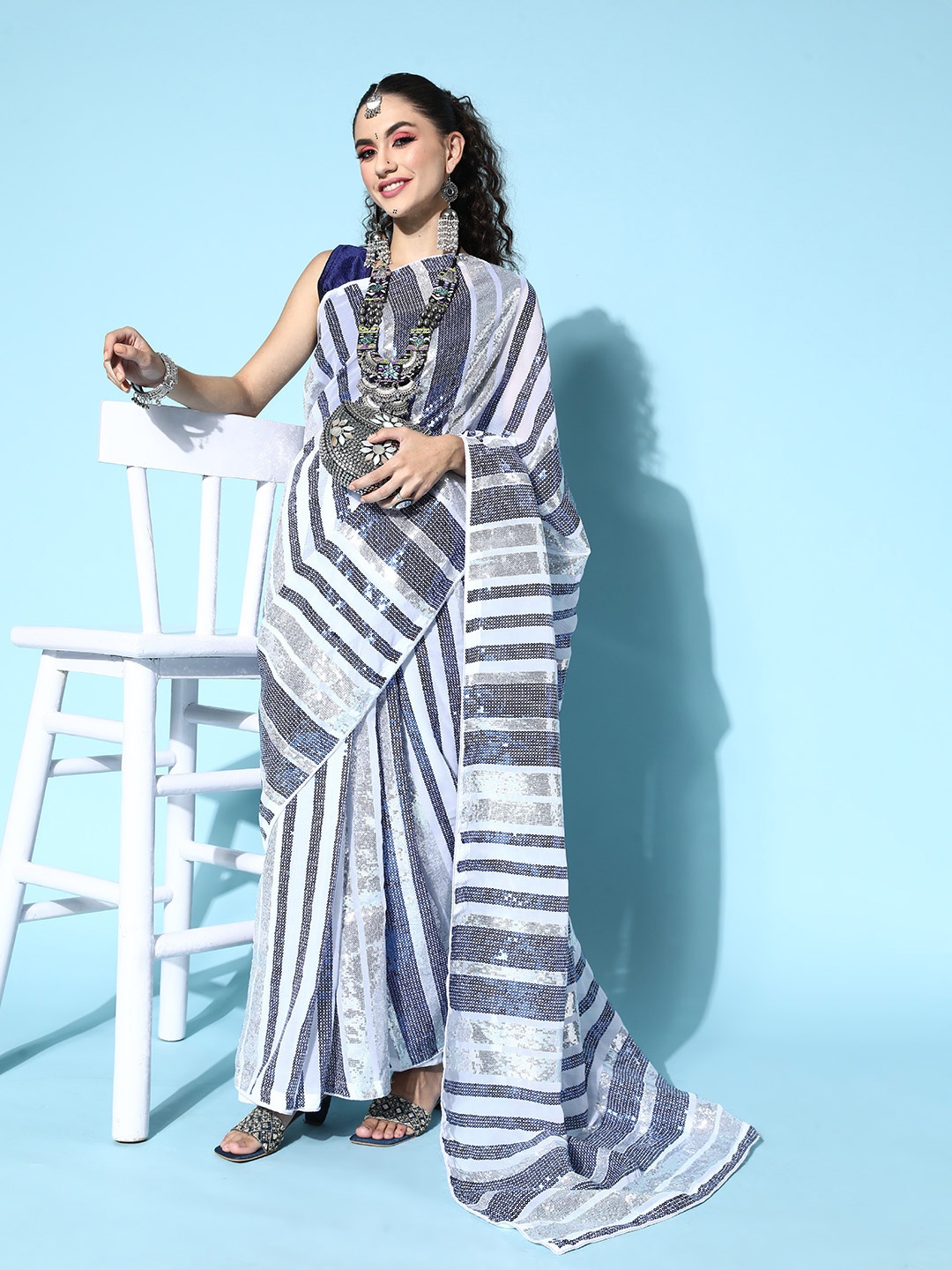 

HERE&NOW Striped Pure Georgette Saree with Embroidered Border, Blue