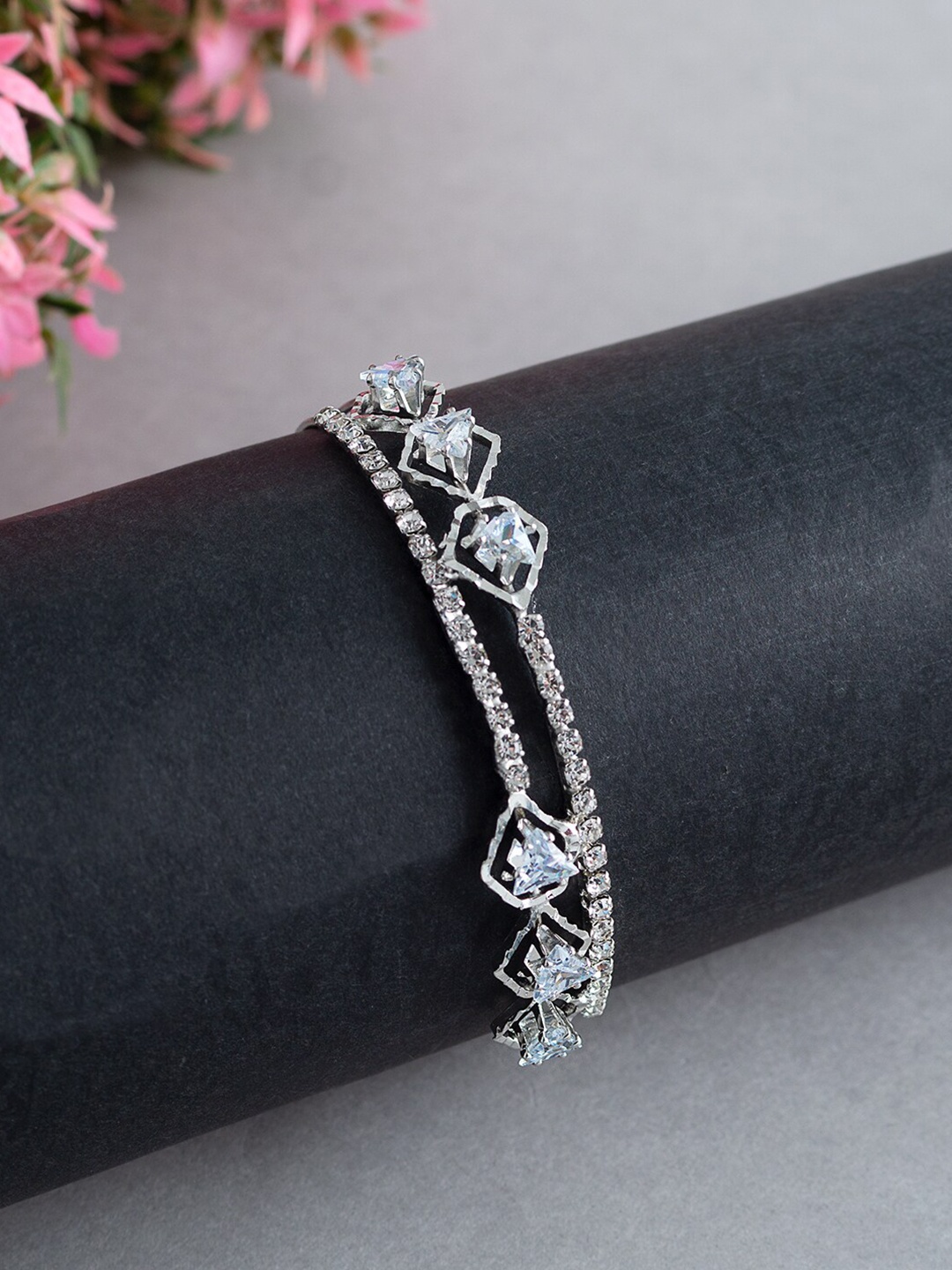 

Golden Peacock Girls Silver-Toned & White Handcrafted Bangle-Style Bracelet