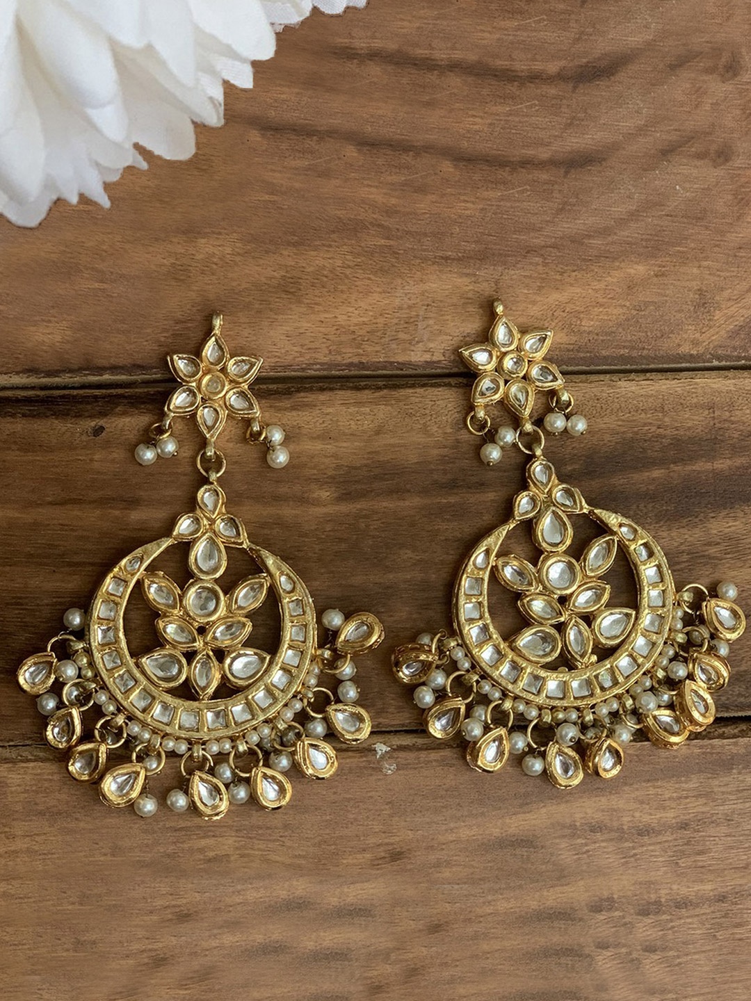 

Ishhaara Gold-Toned & White Brass Plated Kundan Studded Classic Chandbalis Earrings