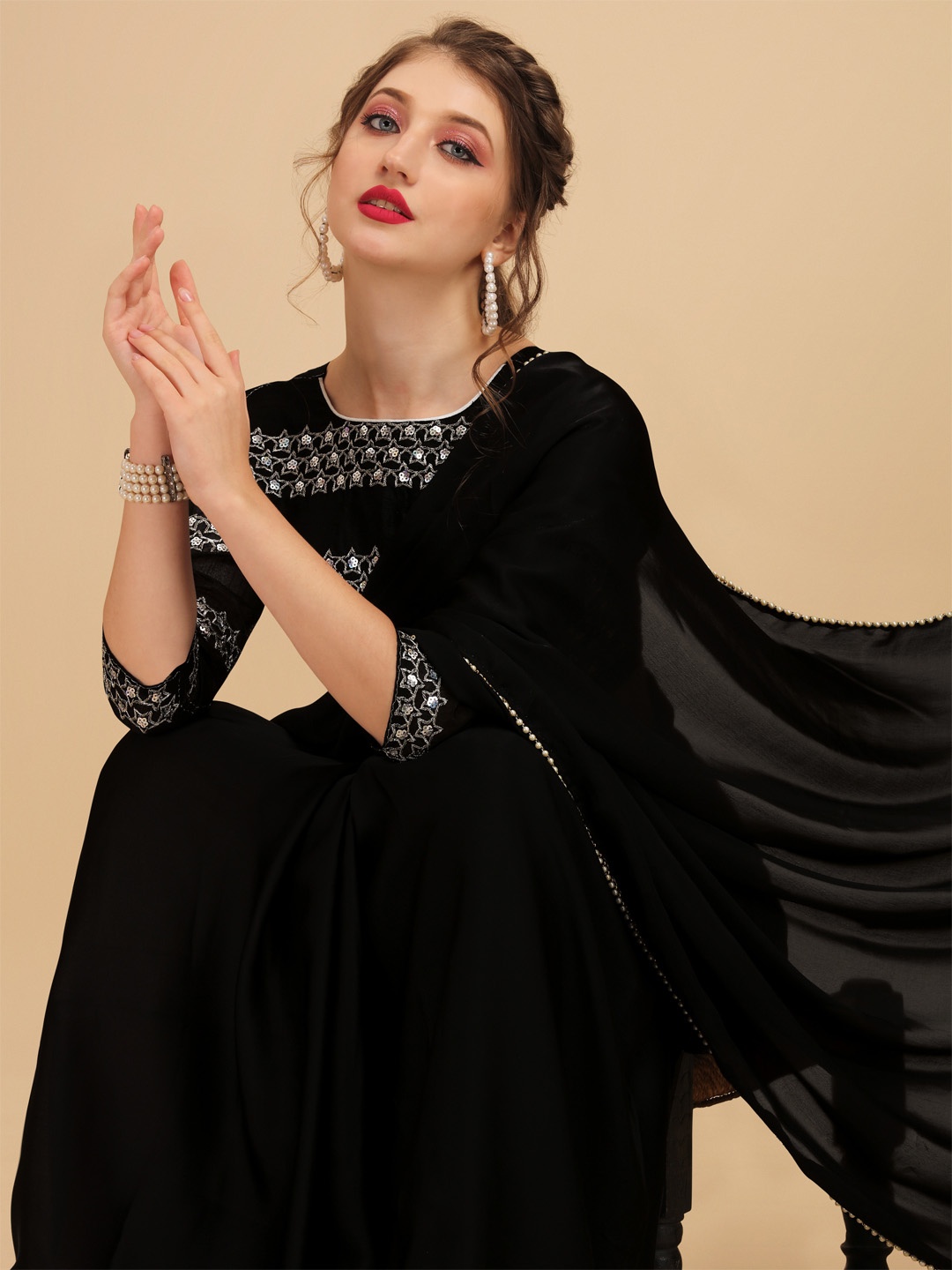 

Sangria Black Embroidered Satin Saree