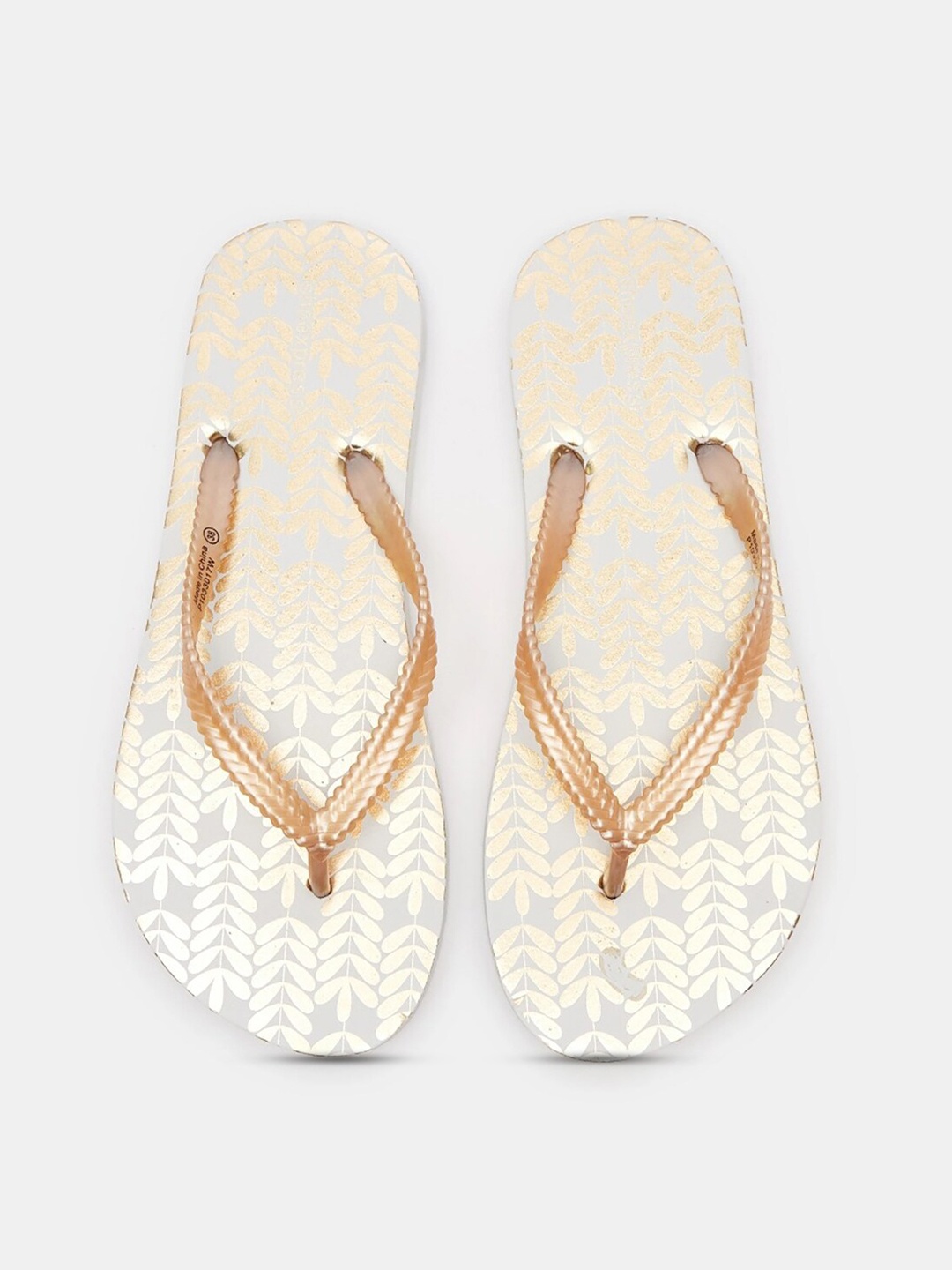 

shoexpress Women Gold-Toned & White Printed Rubber Thong Flip Flops