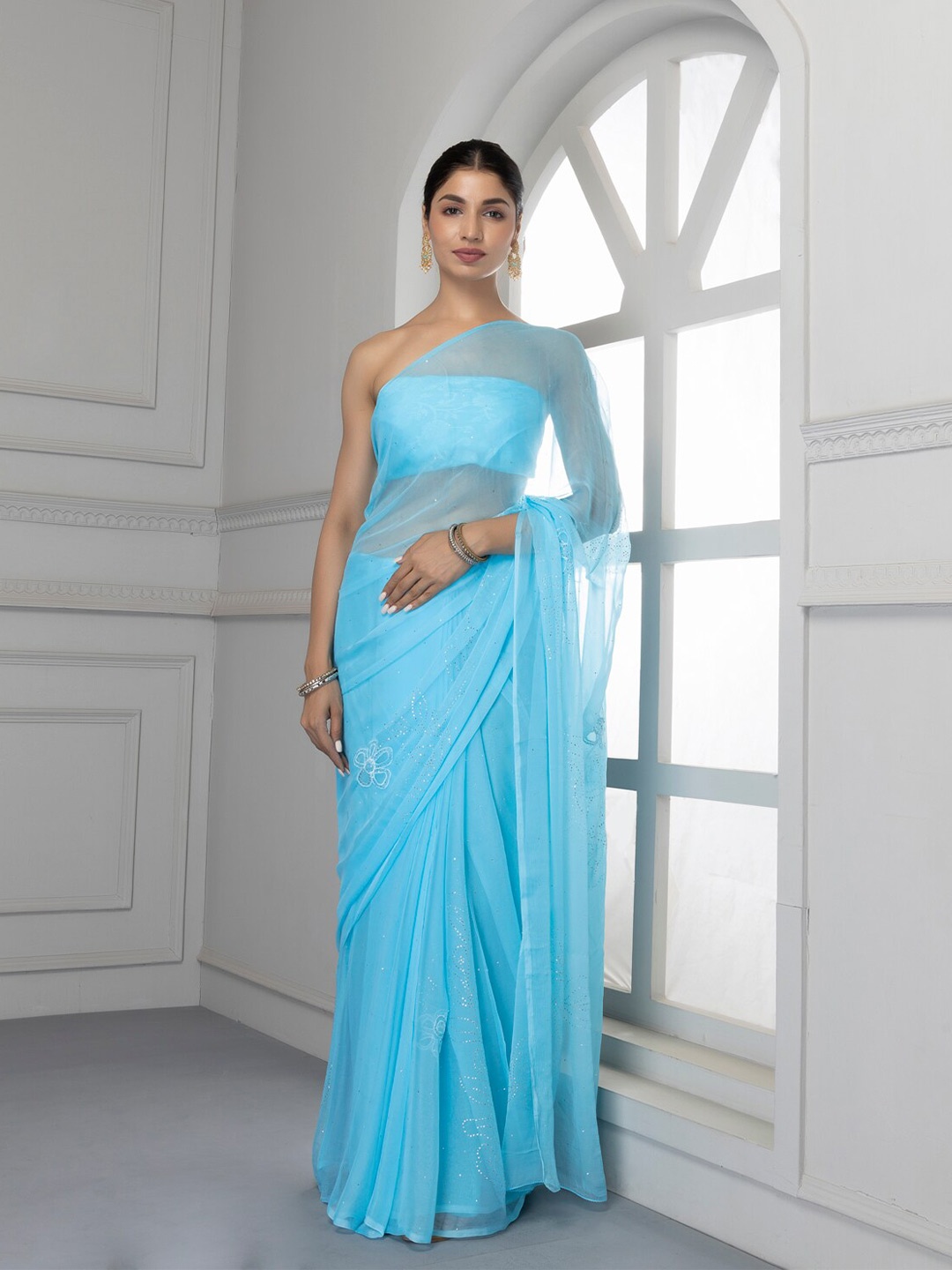

Geroo Jaipur Handcrafted Mukaish Chiffon saree, Turquoise blue