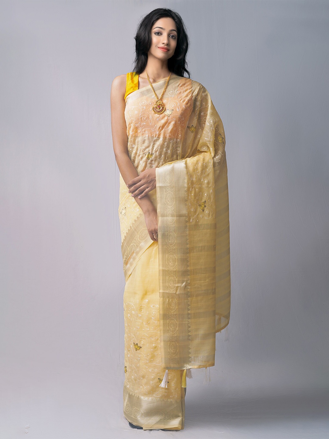 

Unnati Silks Women Yellow & Silver-Toned Floral Zari Pure Linen Jamdani Saree