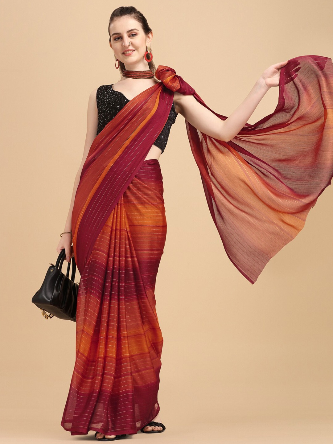 

Sangria Maroon Georgette Striped Zari Work Saree