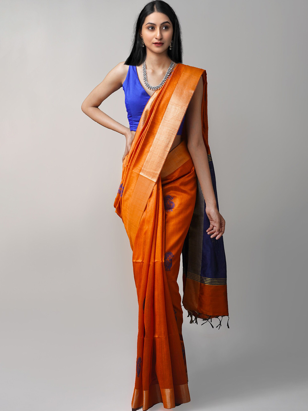 

Unnati Silks Rust & Gold-Toned Woven Design Zari Silk Blend Tussar Saree
