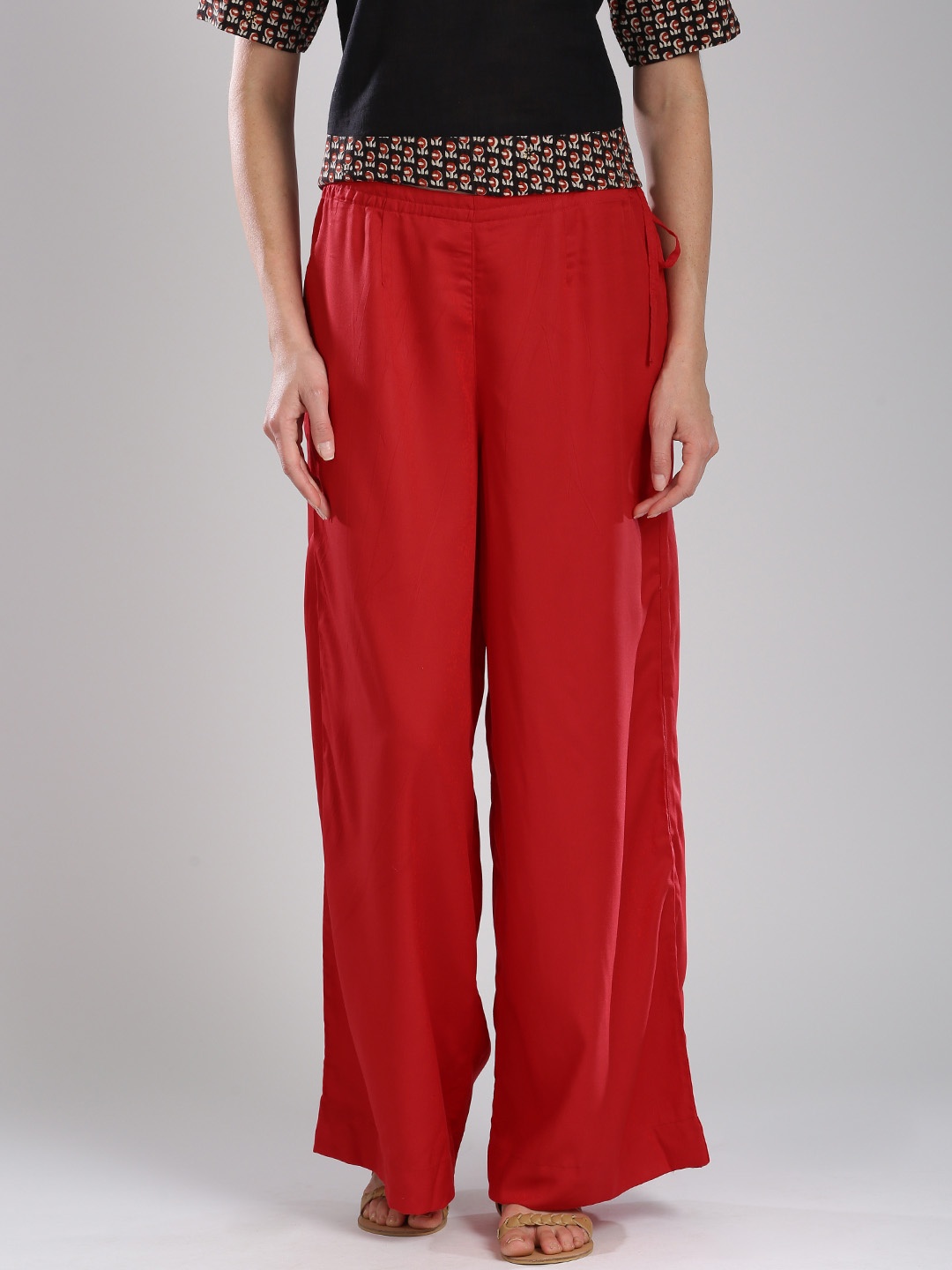 

Fabindia Women Red Solid Palazzo Trousers