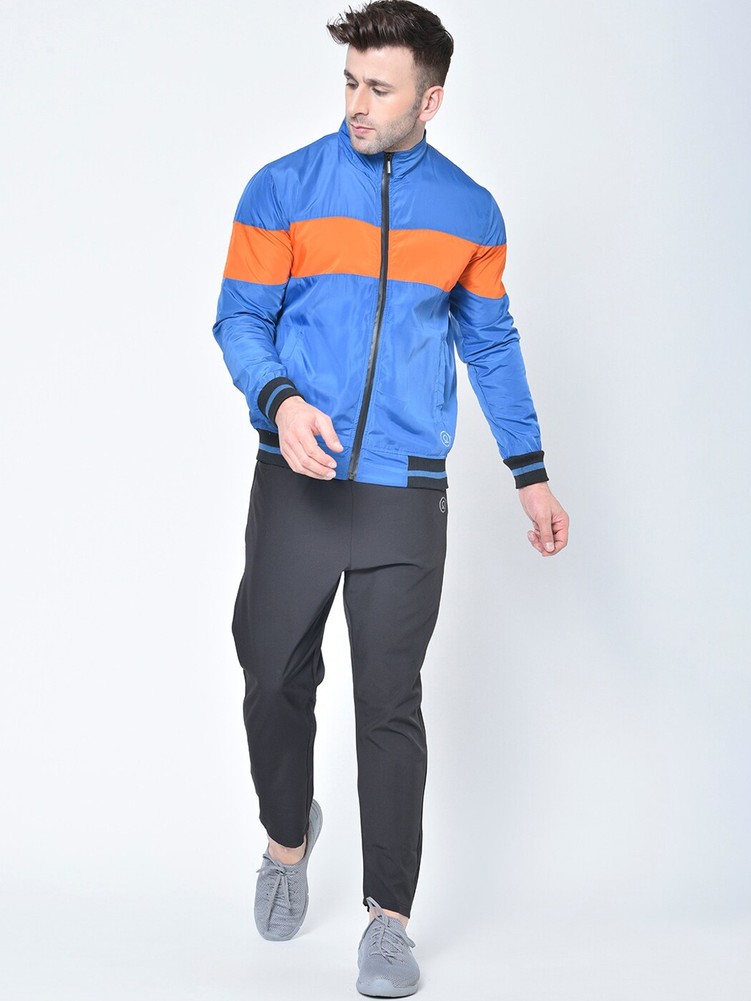 

Chkokko Men Blue & Orange Solid Track Suit