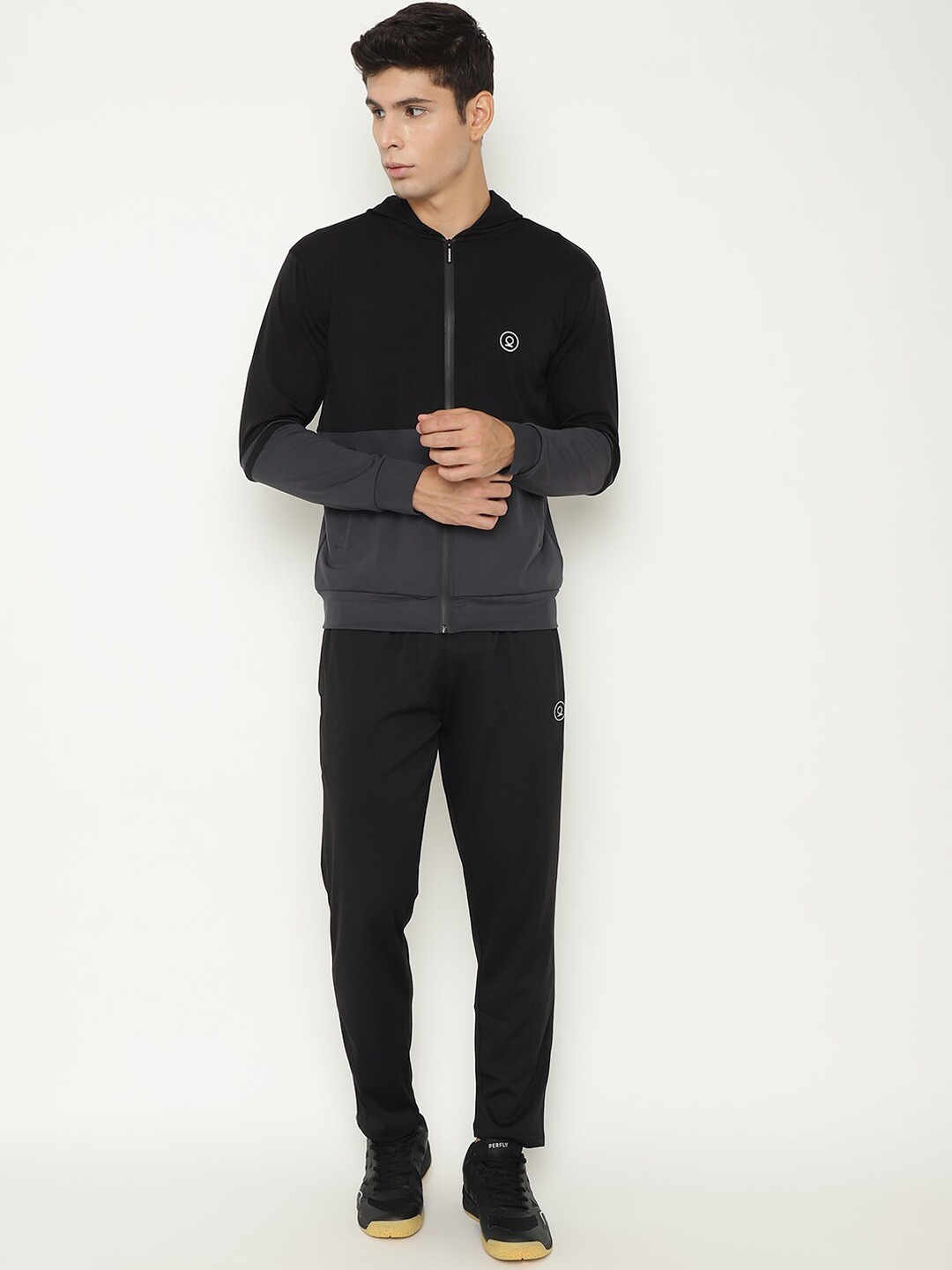 

Chkokko Men Black & Grey Solid Hooded Tracksuit