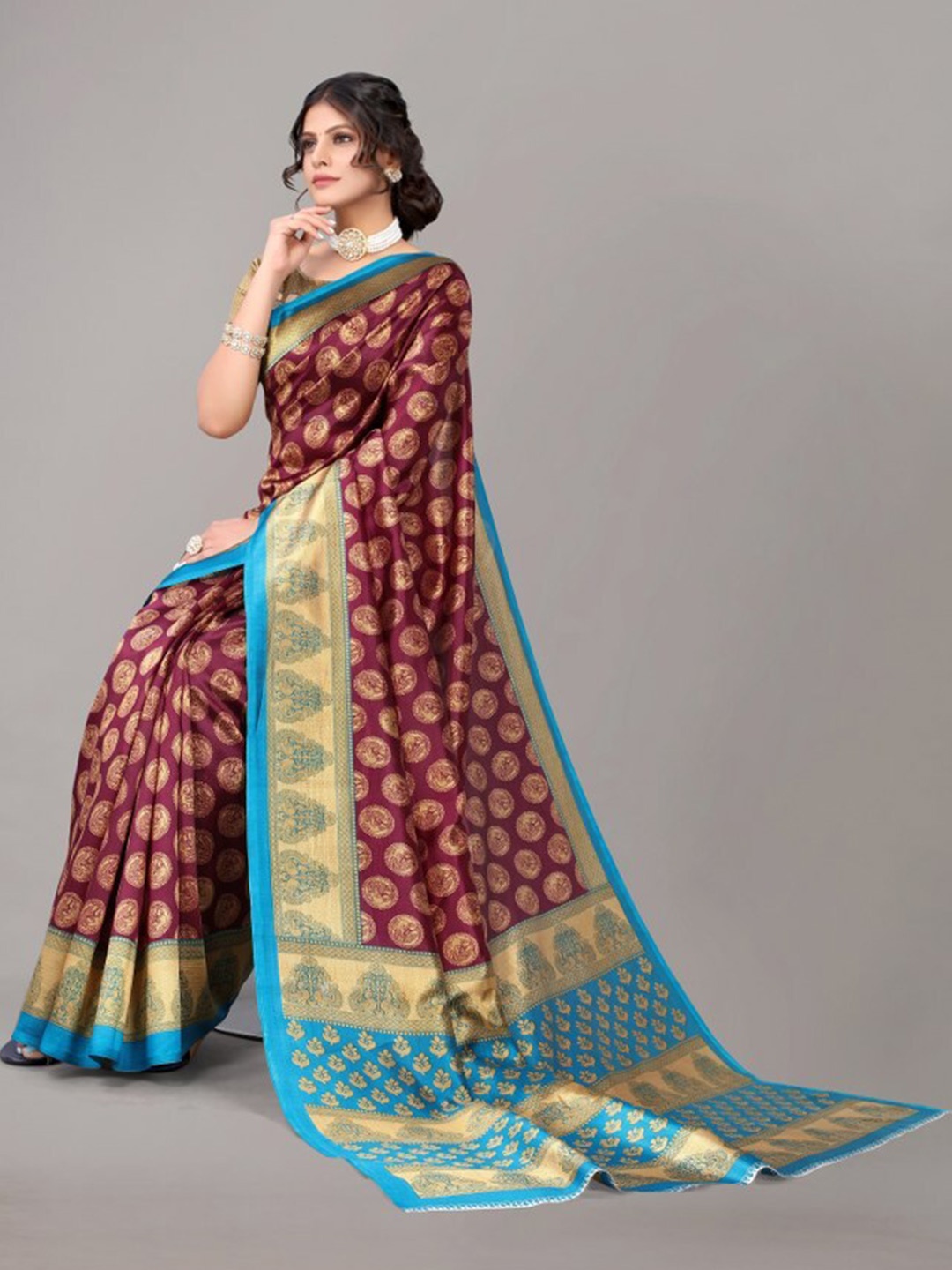 

Yashika Burgundy & Turquoise Blue Ethnic Motifs Printed Art Silk Saree