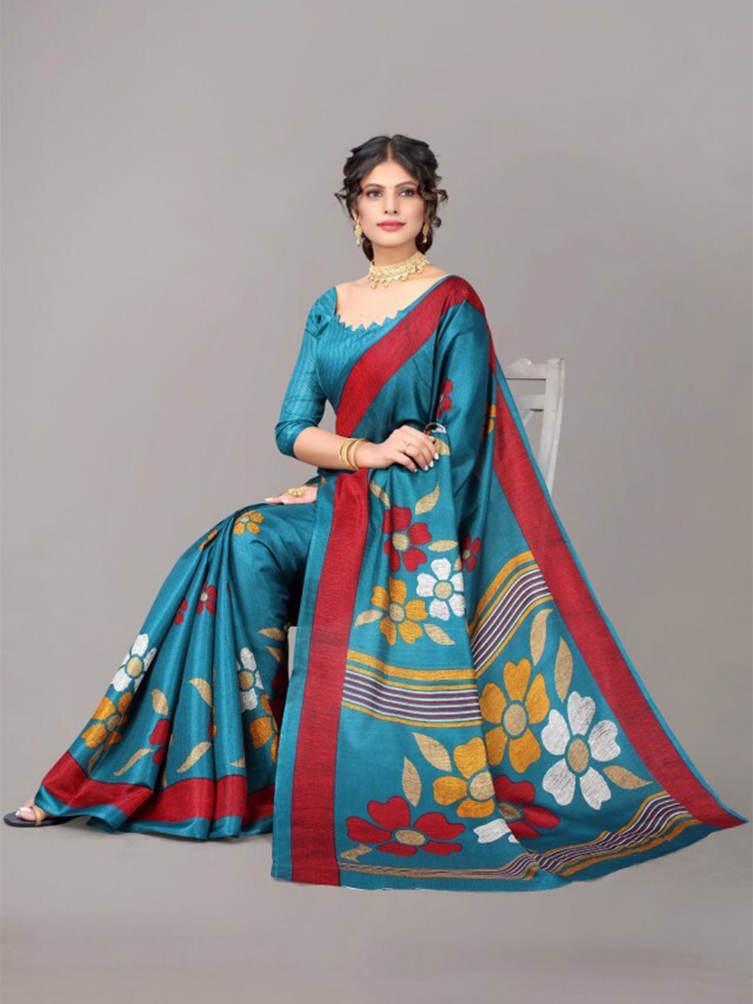 

Yashika Teal Blue & Red Floral Printed Art Silk Saree