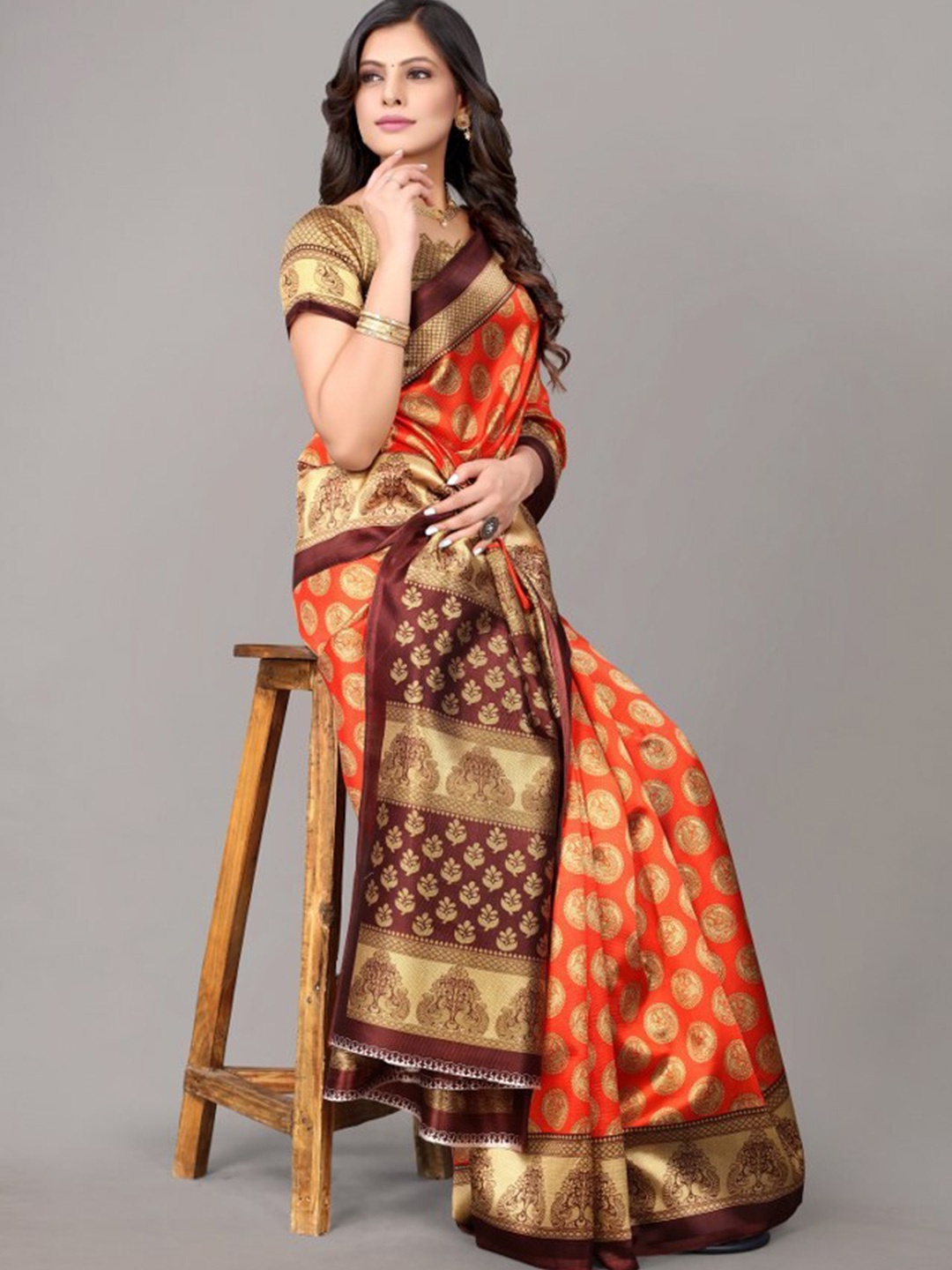 

Yashika Orange & Brown Ethnic Motifs Art Silk Khadi Saree
