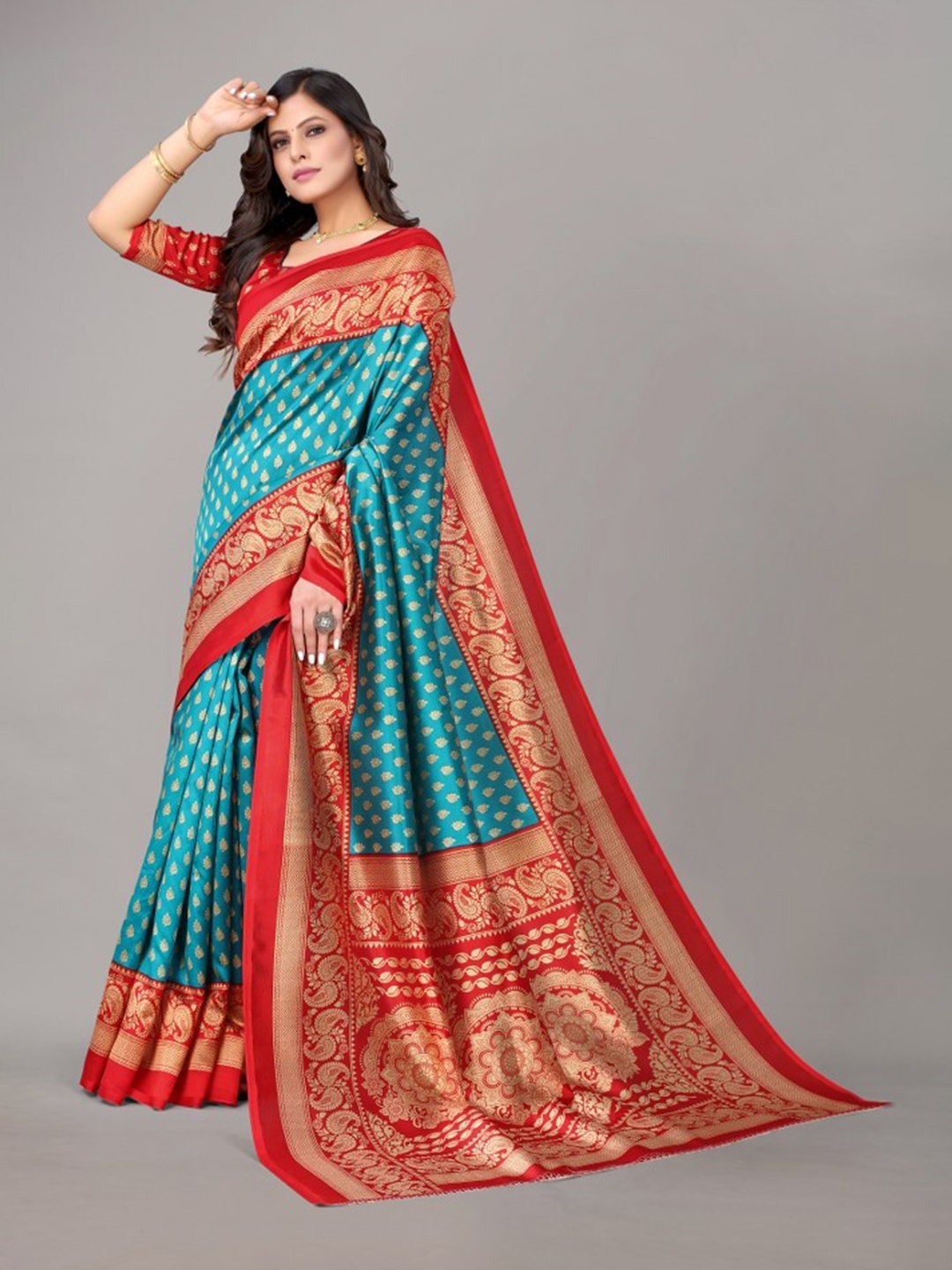 

Yashika Teal & Red Ethnic Motifs Art Silk Khadi Saree