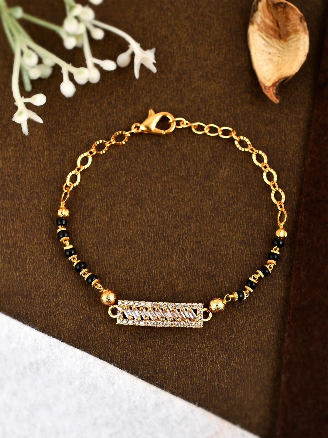 

Shoshaa Women Gold-Plated Black & White Brass Bracelet
