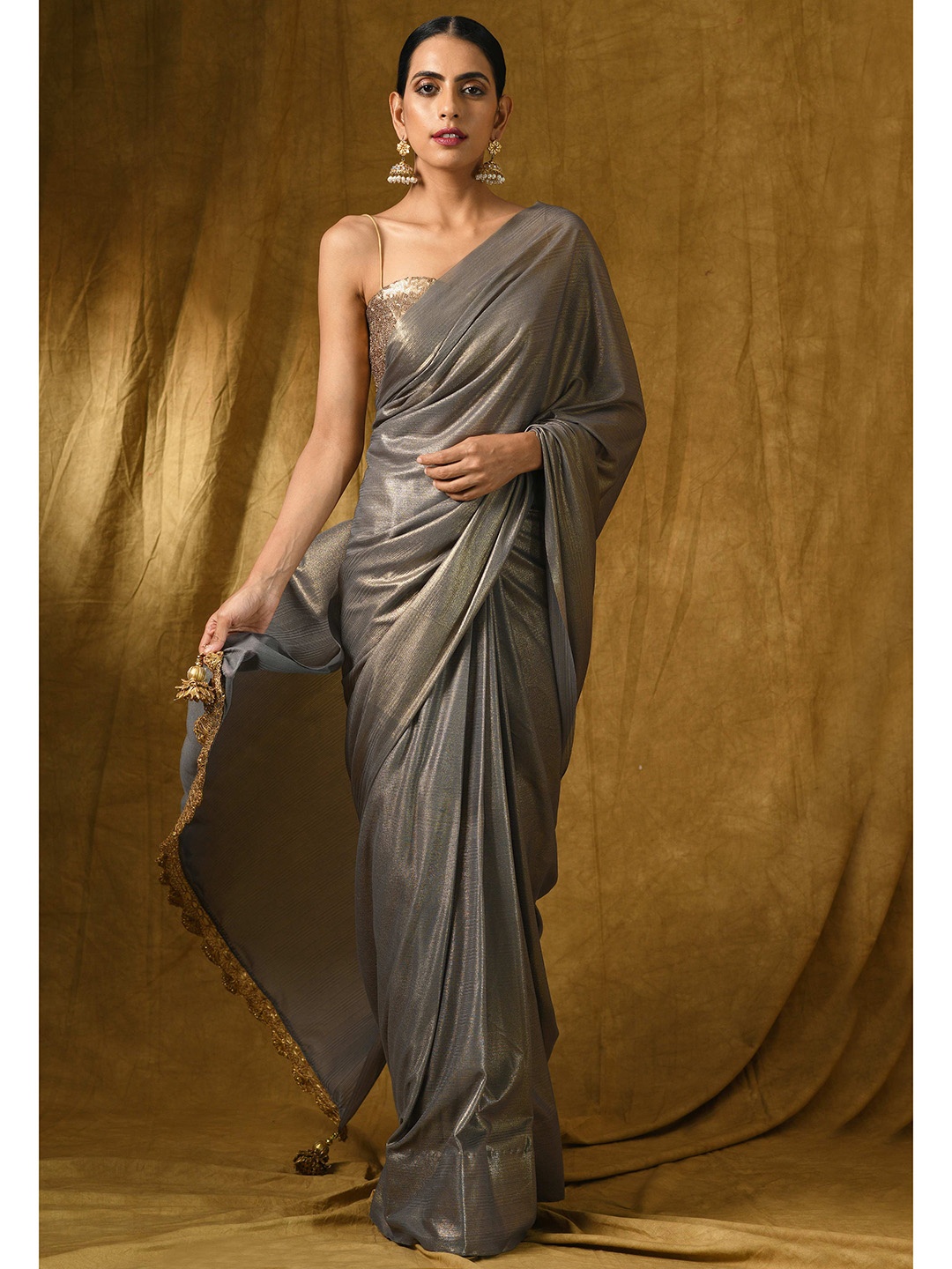 

Swtantra Grey & Golden Pure Chiffon Saree