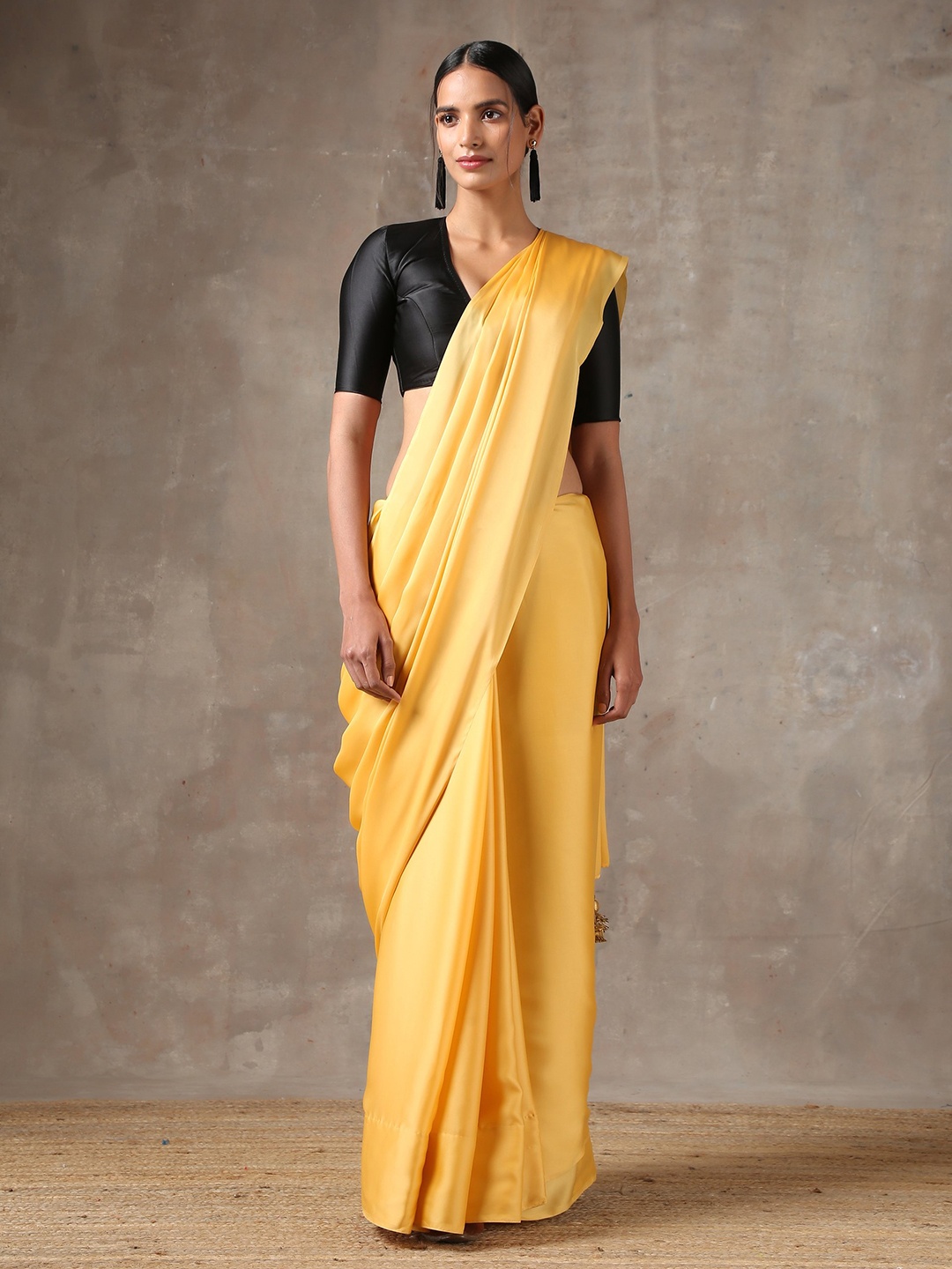 

Swtantra Yellow Satin Saree