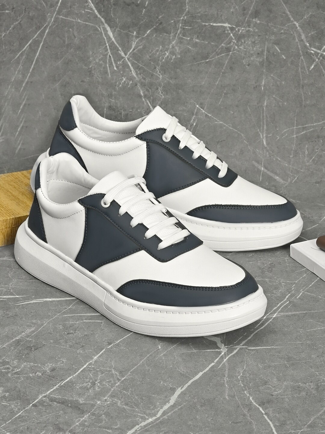 

Roadster Men White Colourblocked Sneakers