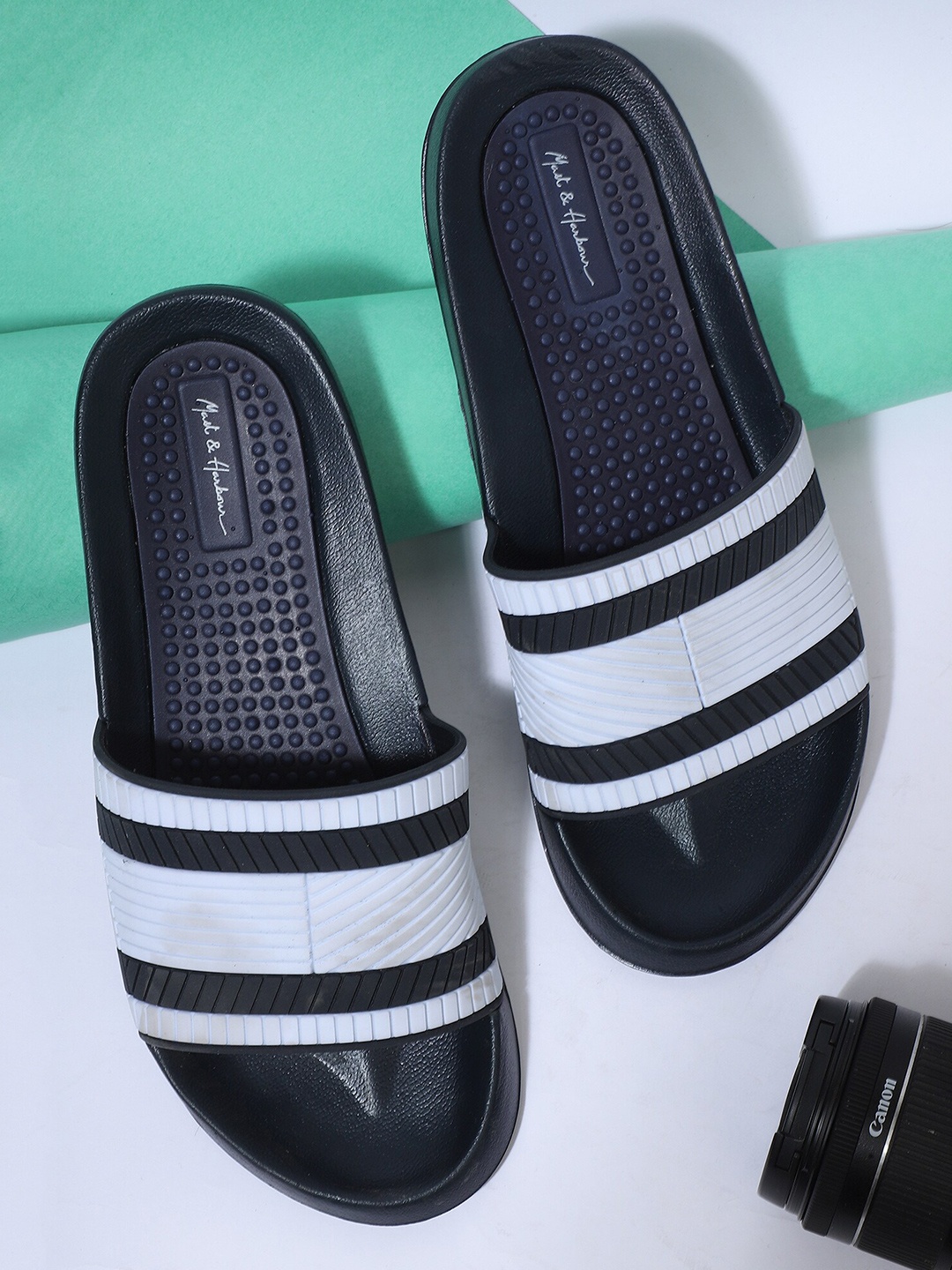 

Mast & Harbour Men Navy Blue & White Striped Sliders