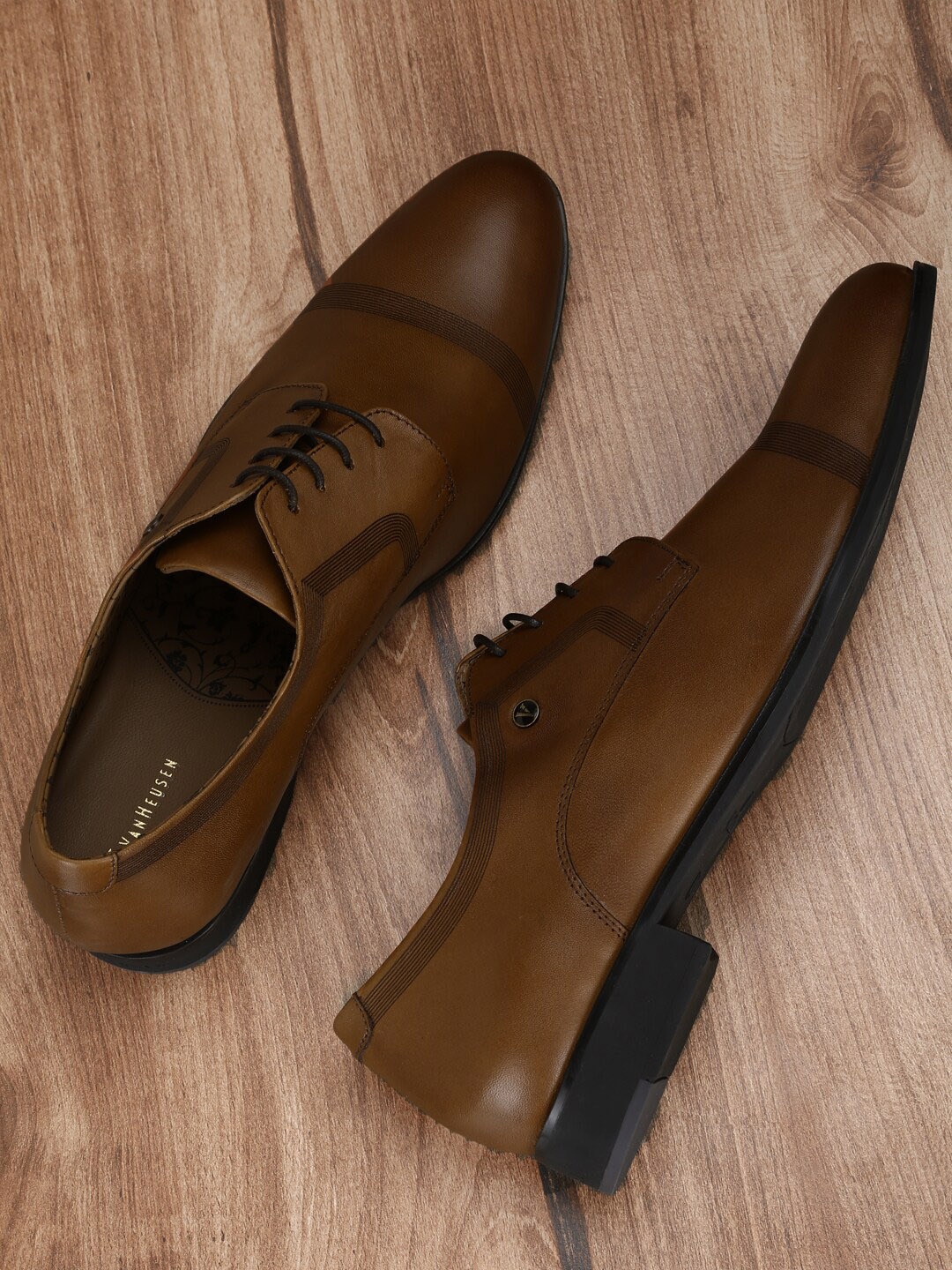 

Van Heusen Men Brown Solid Leather Formal Derby Shoes