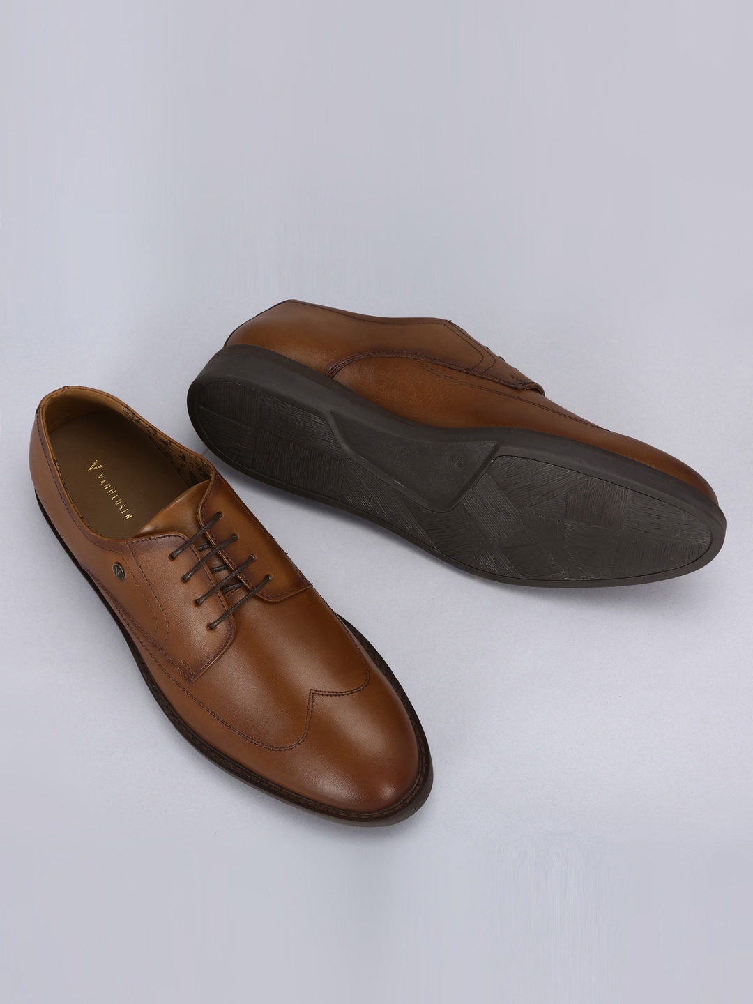 

Van Heusen Men Brown Solid Leather Formal Derbys