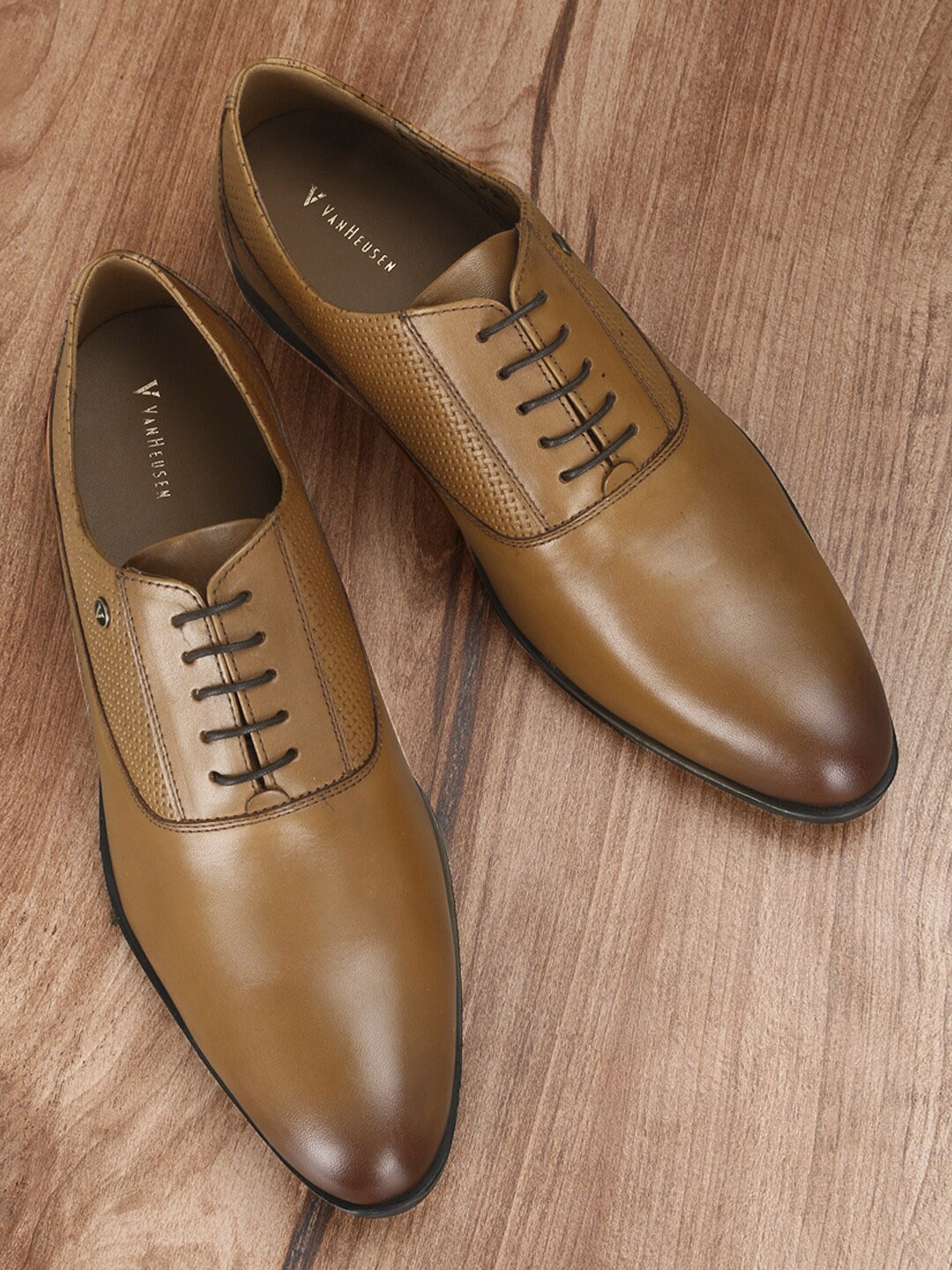 

Van Heusen Men Brown Solid Leather Formal Oxford