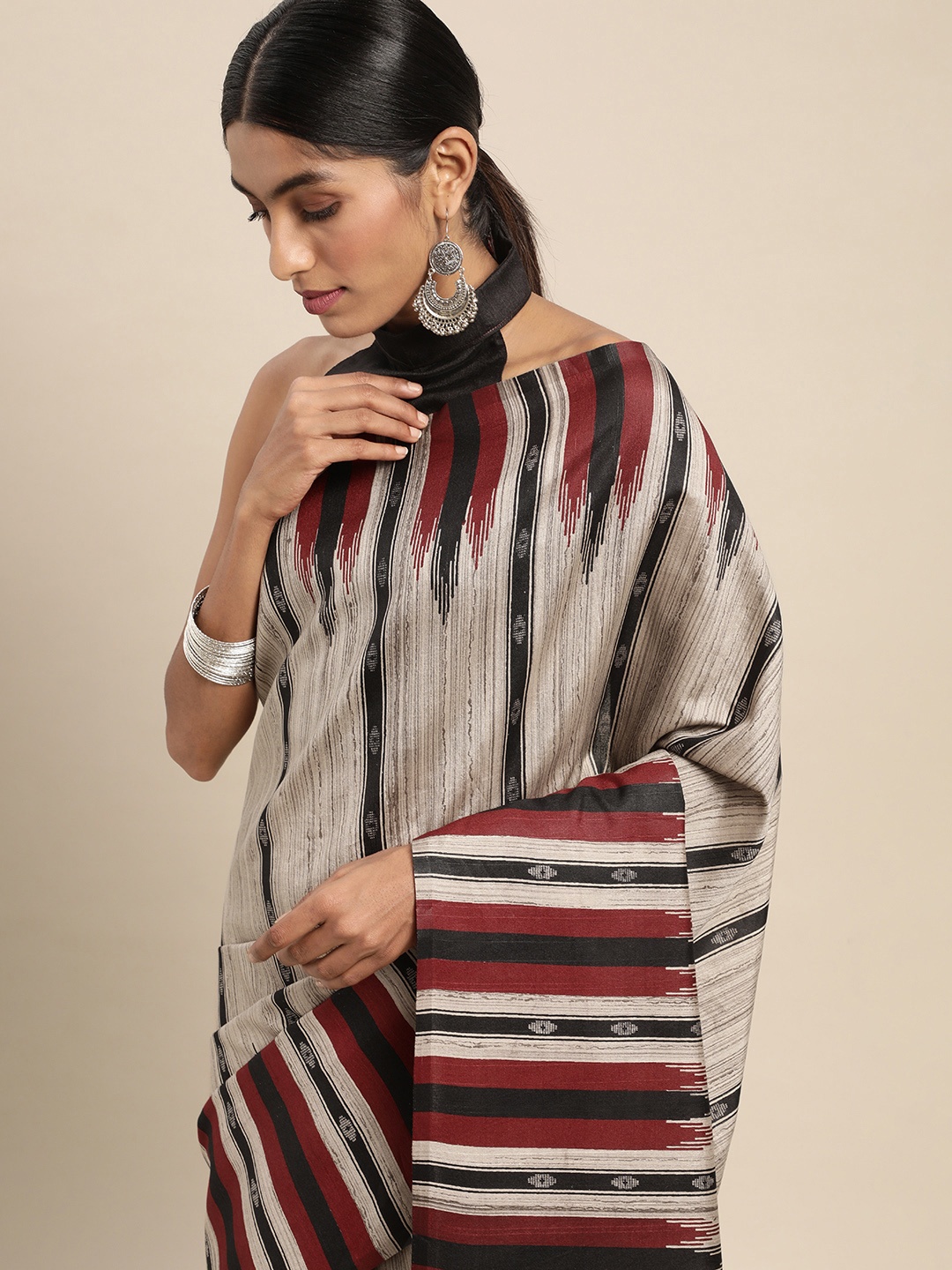

Saree mall Beige & Red Striped Art Silk Taant Saree
