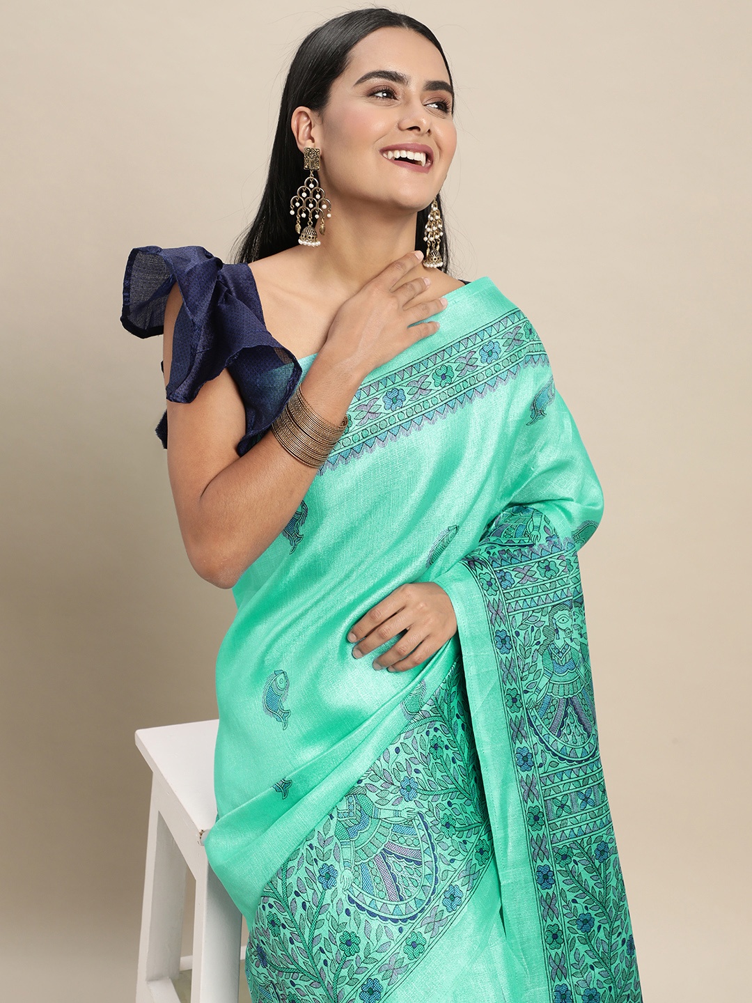 

Saree mall Sea Green & Black Ethnic Motifs Printed Saree