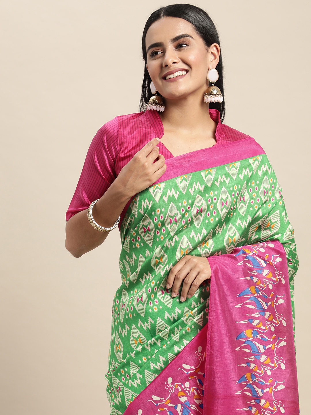 

Saree mall Green & Pink Ethnic Motifs Ikat Printed Saree