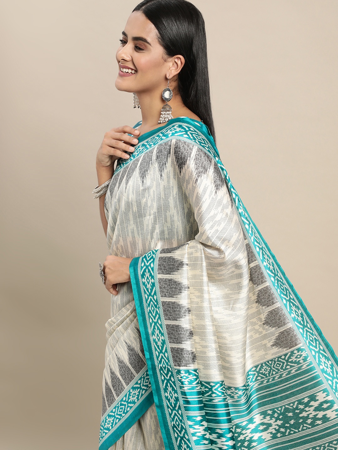 

Saree mall Off White & Grey Ikat Printed Sarees