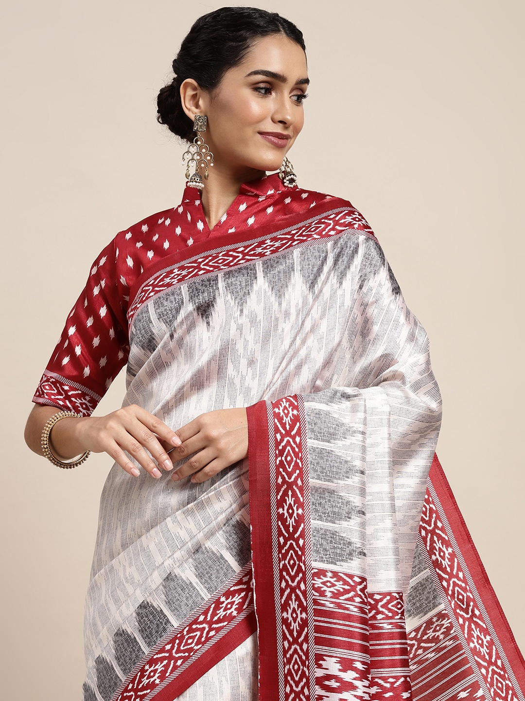 

Saree mall Off White & Maroon Ikat Printed Sarees