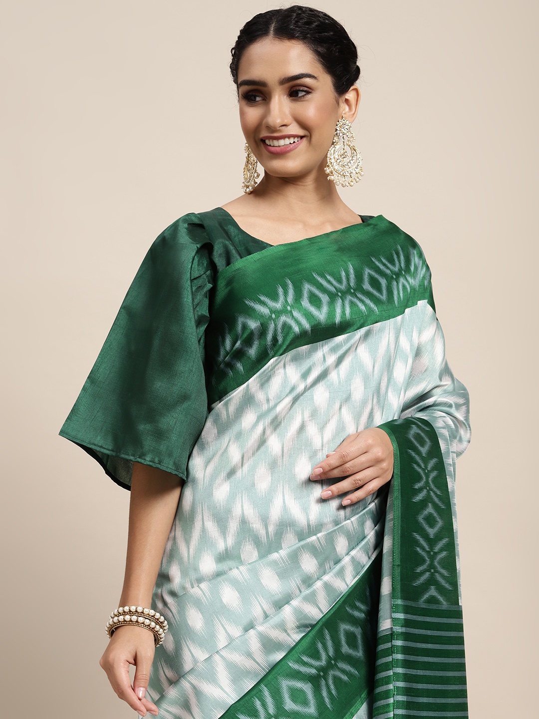 

Saree mall Off White & Green Ikat Printed Sarees