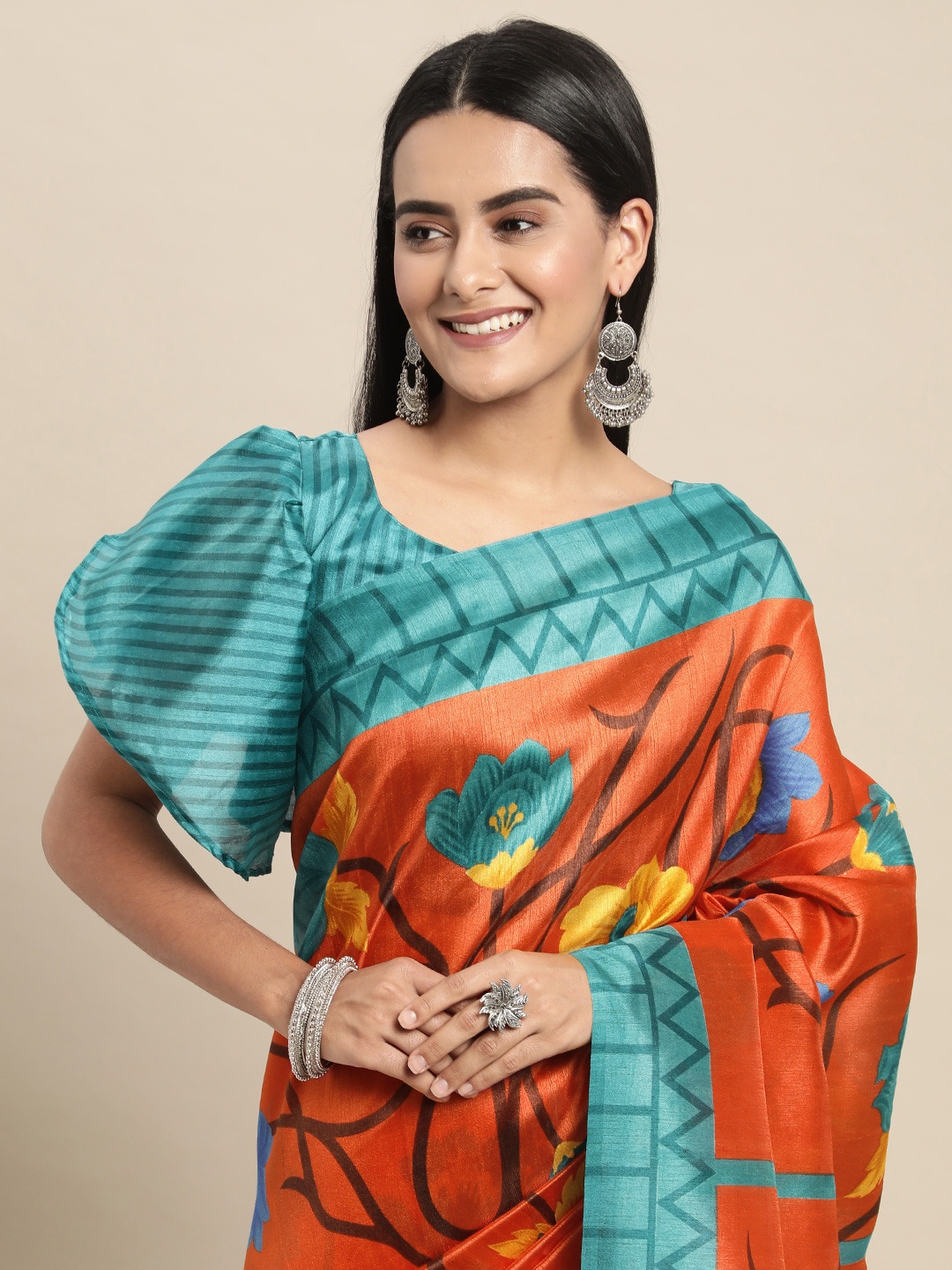 

Saree mall Rust & Blue Floral Printed Sarees