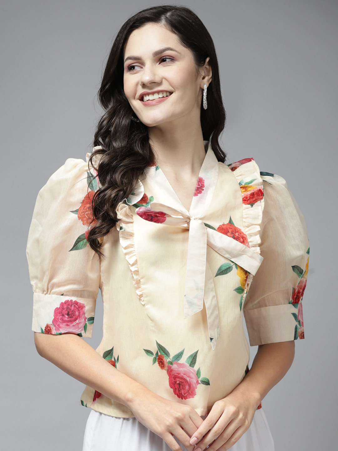 

Bhama Couture Beige Floral Print Tie-Up Neck Ruffles Top